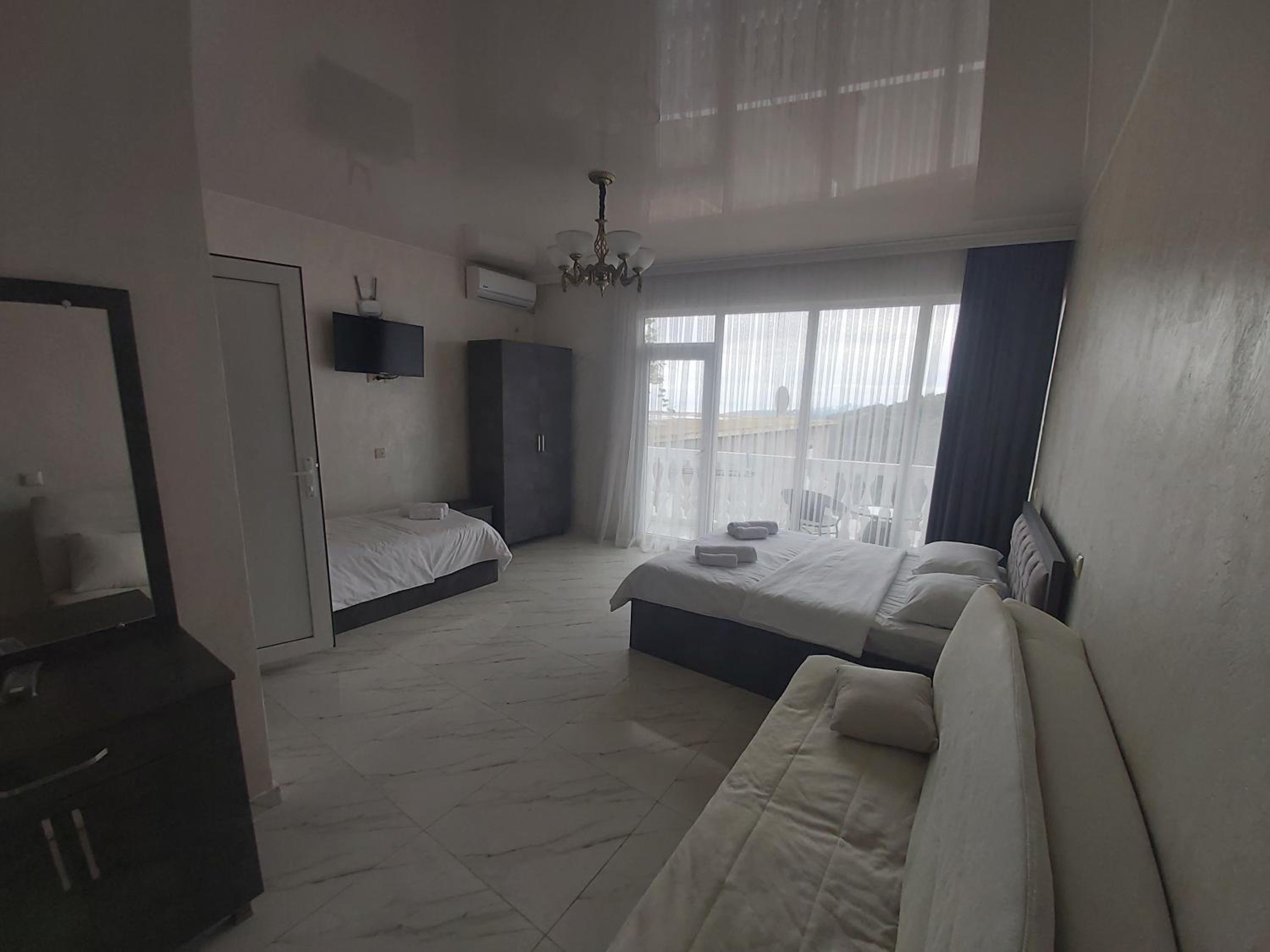 Quadruple Room with Private Bathroom