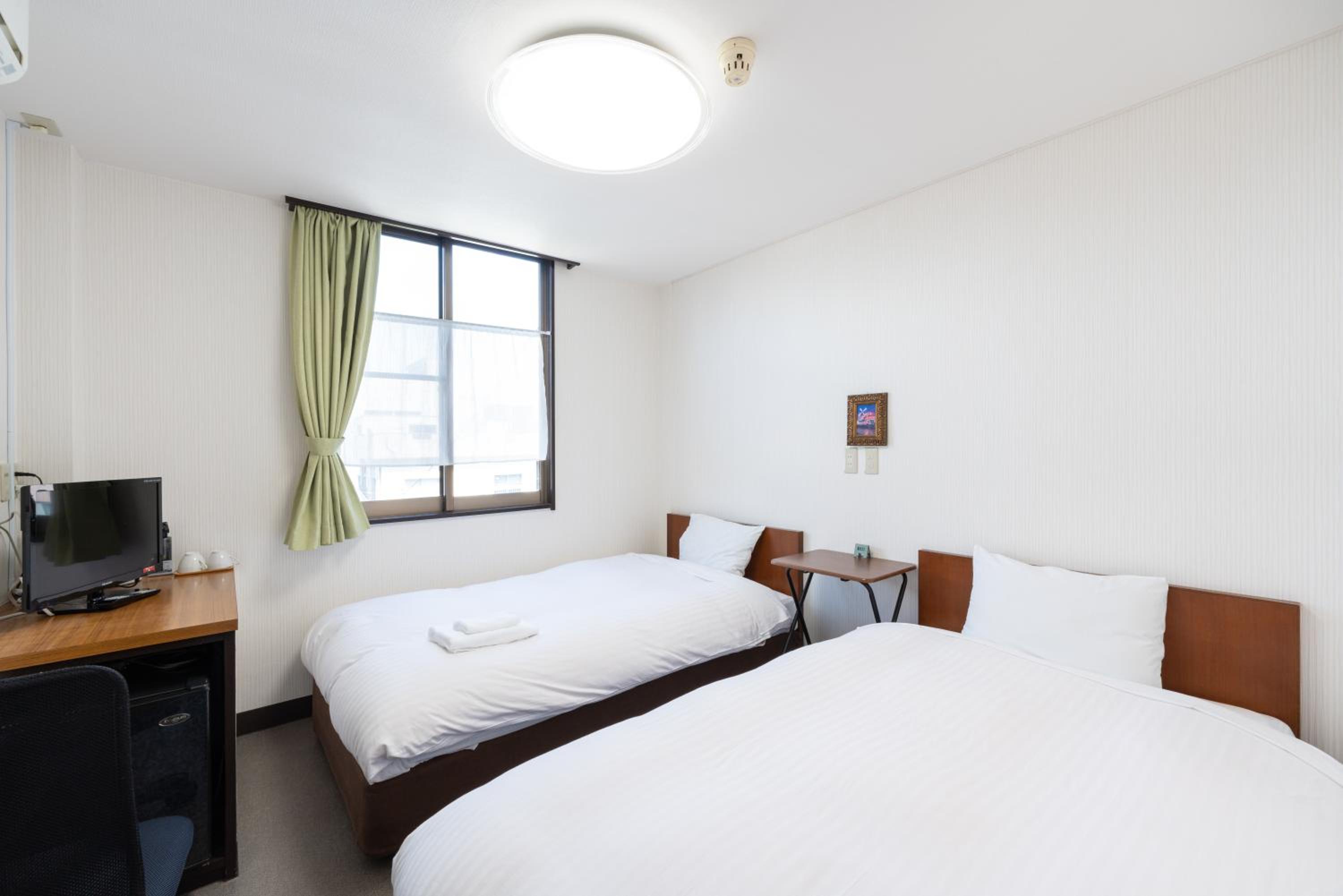 Standard Twin Room - Photo 1
