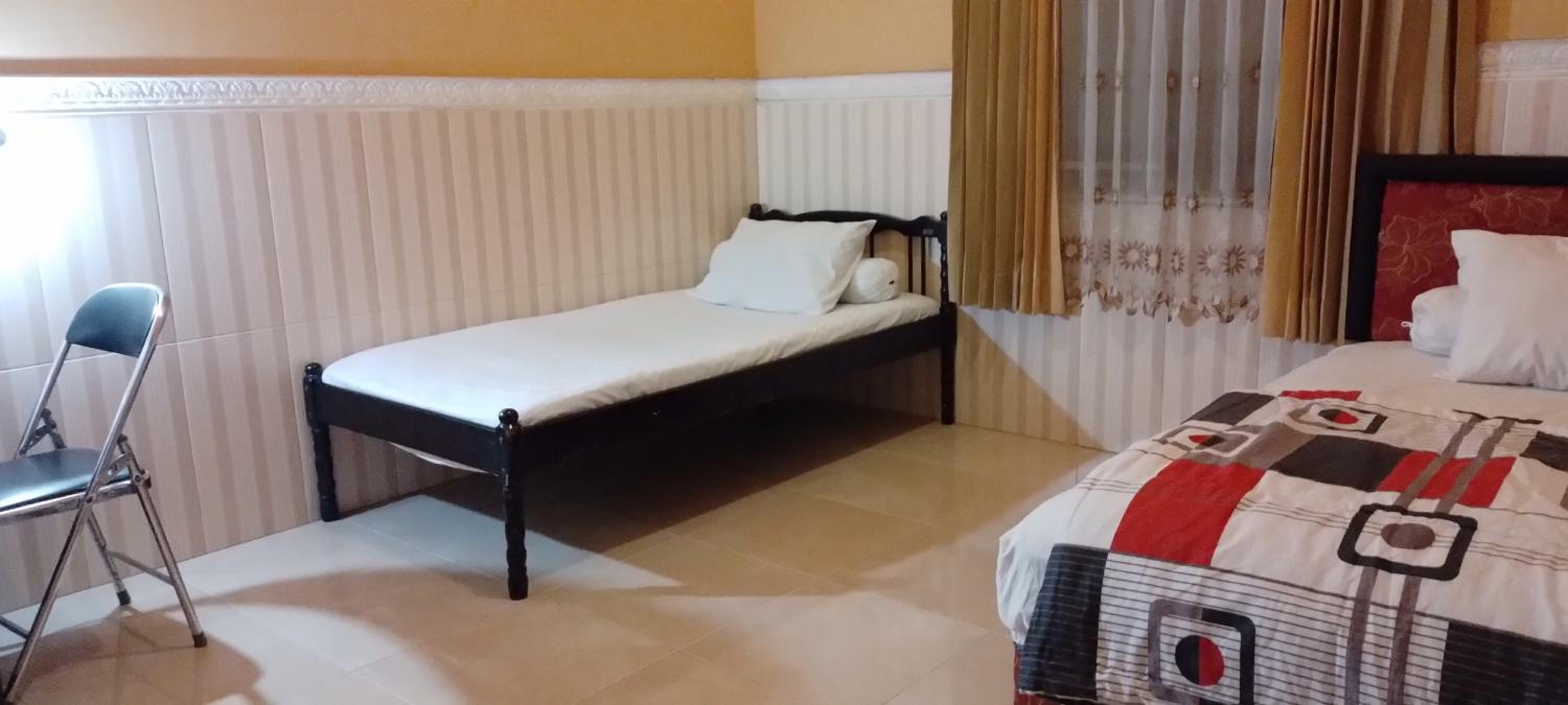 Budget Twin Room - Photo 5