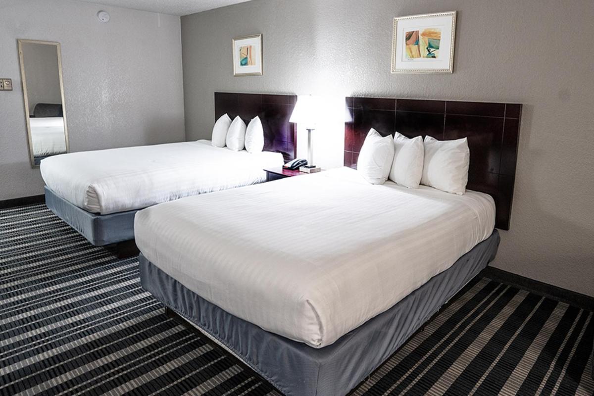Queen Room with Two Queen Beds - Photo 1