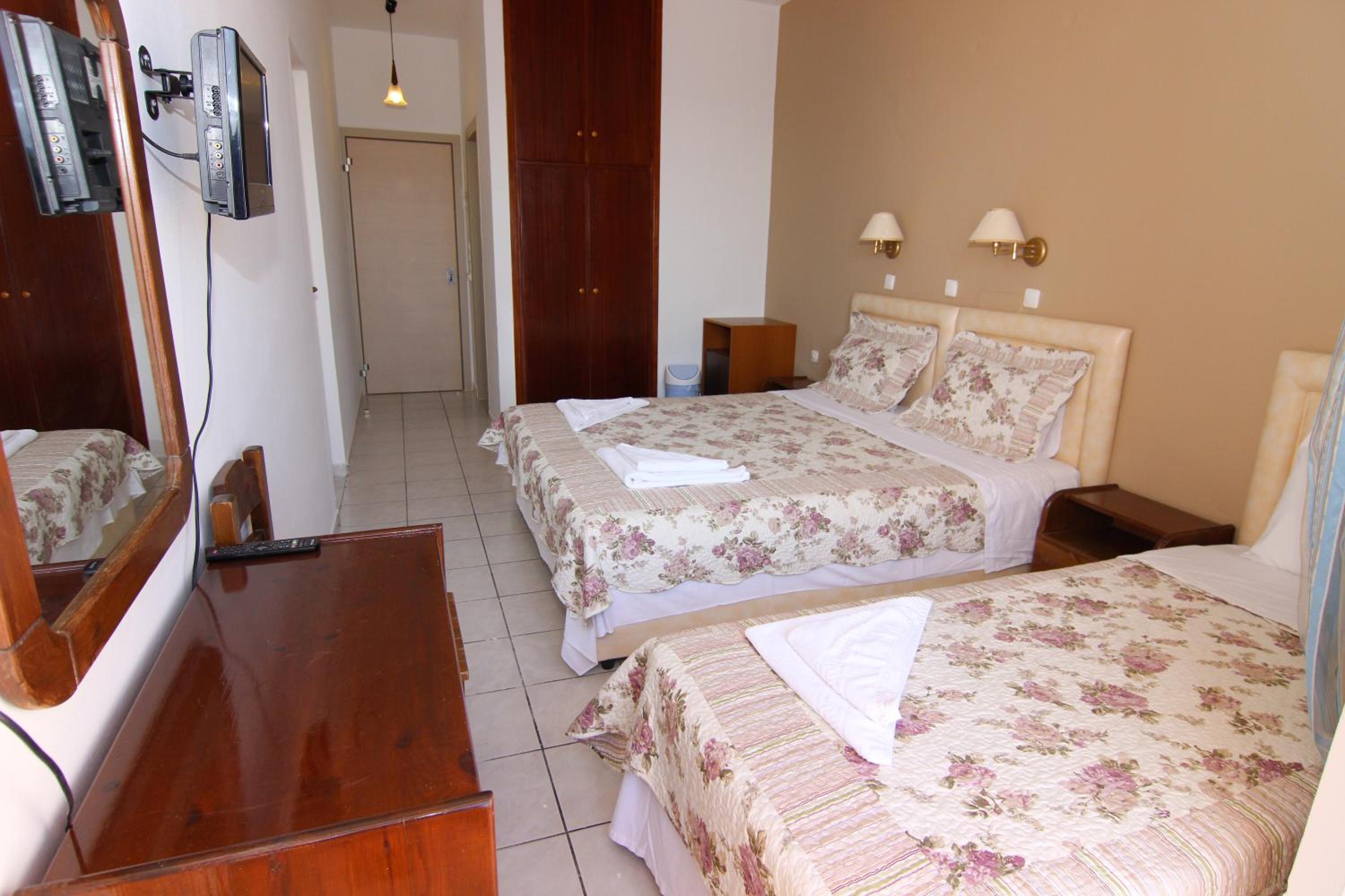 Quarto Triplo com Vista para o Mar