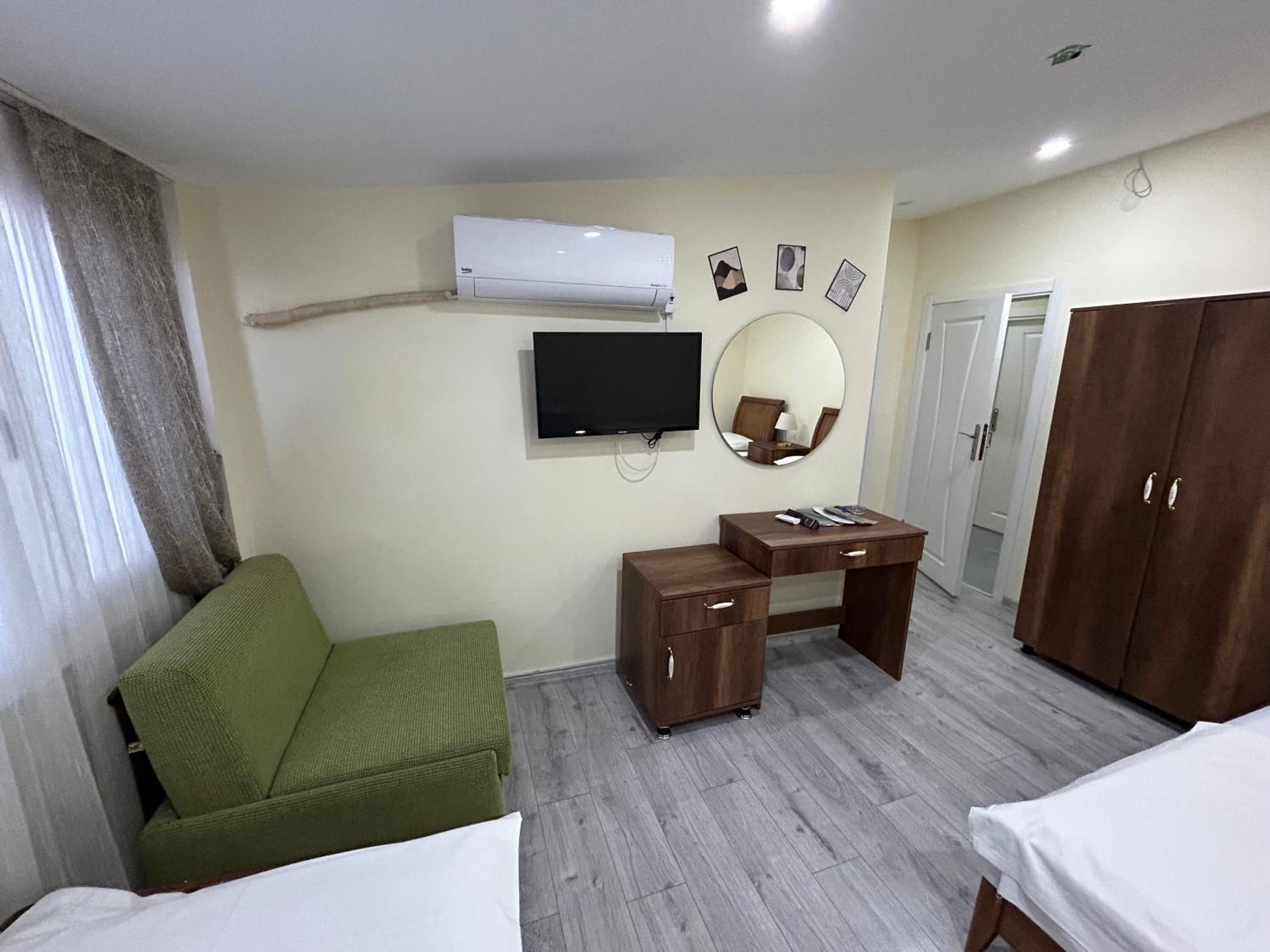 Deluxe Triple Room