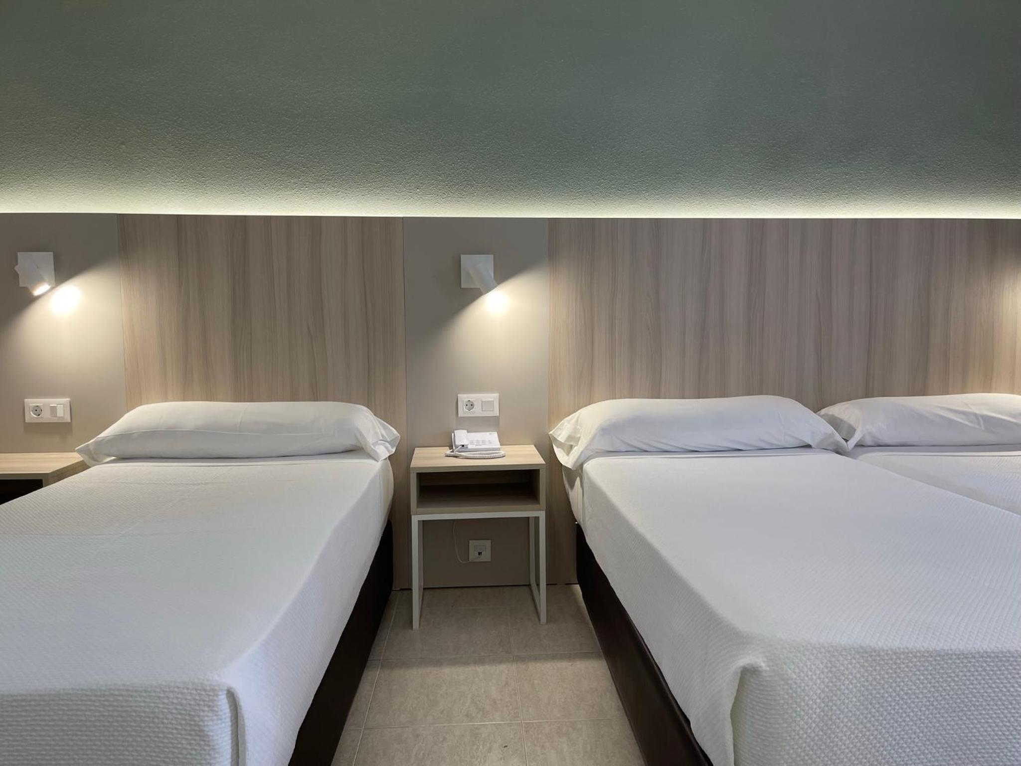 Habitación doble (2 adultos + 1 niño)