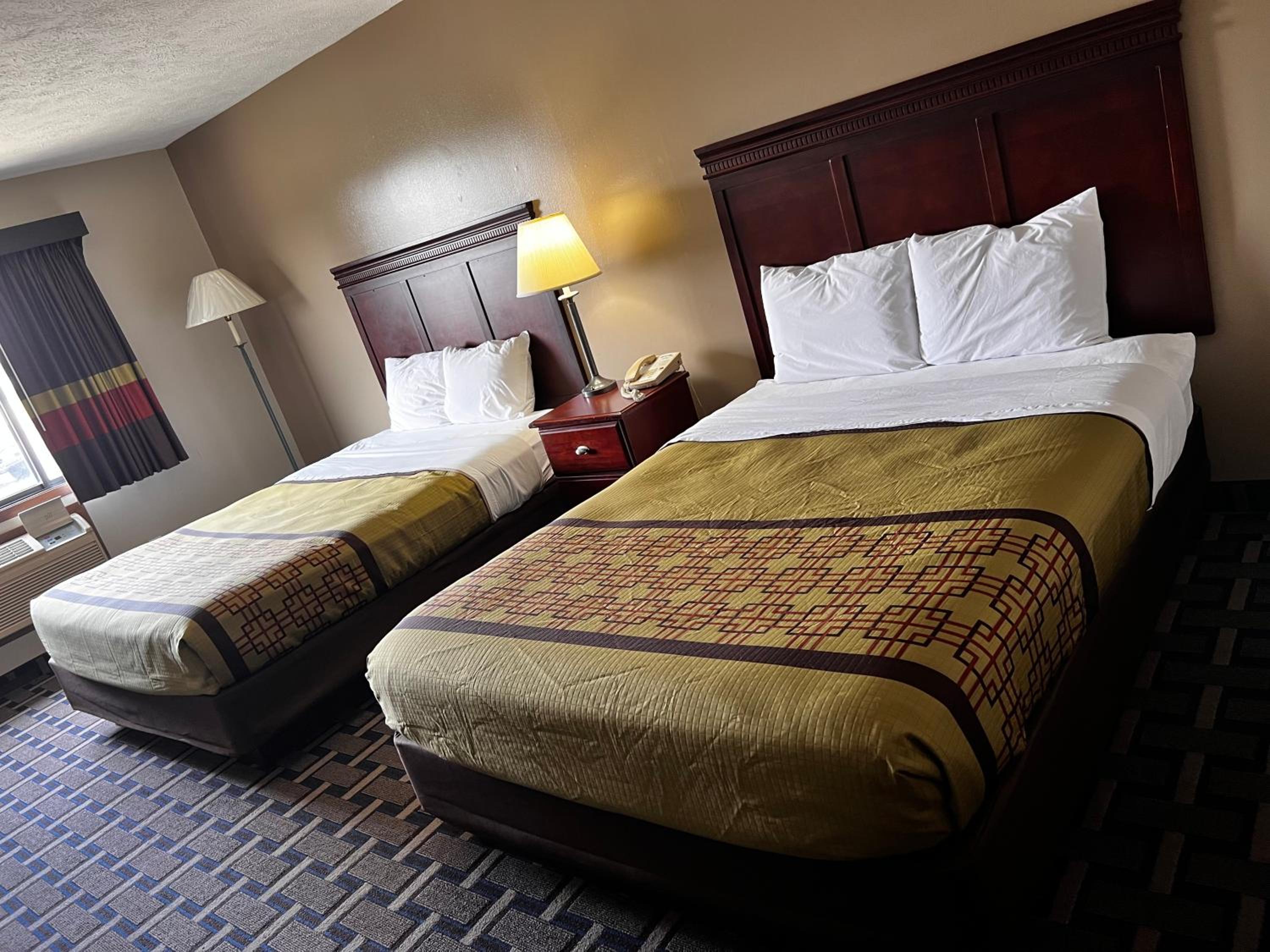Queen Room with Two Queen Beds - Photo 1