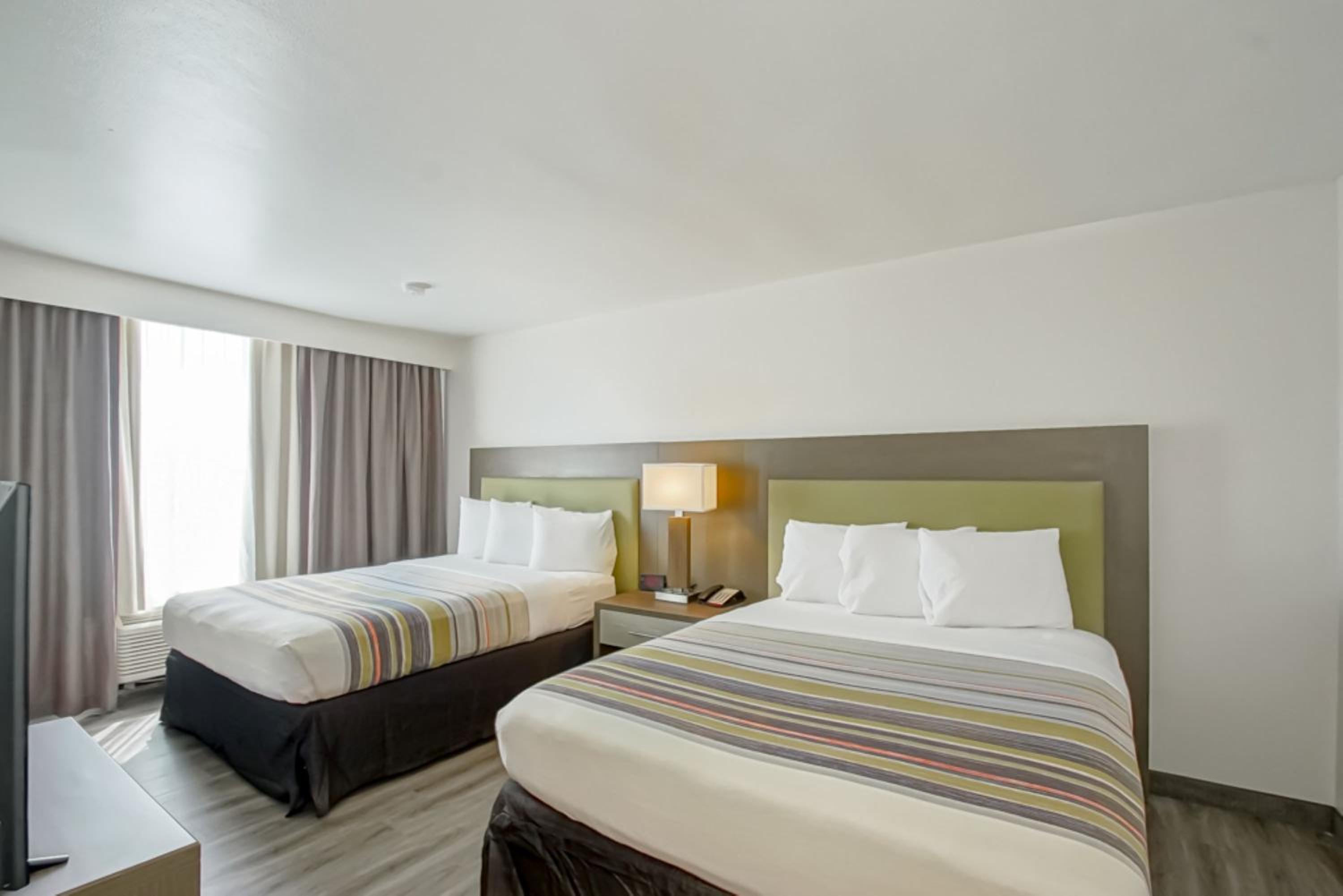 Queen Room with Two Queen Beds - Non-Smoking photo 1