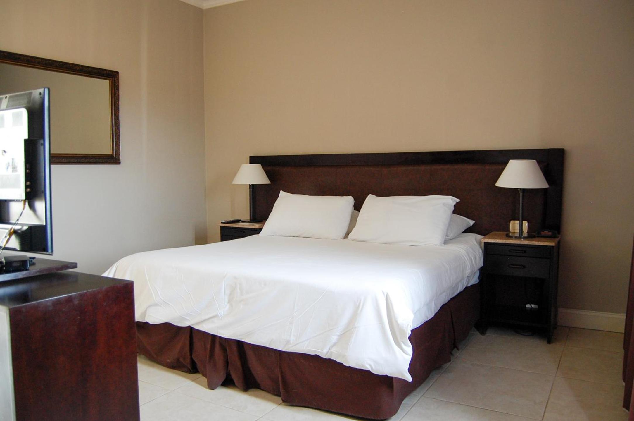 Resort King Guest Room with One Queen Bed