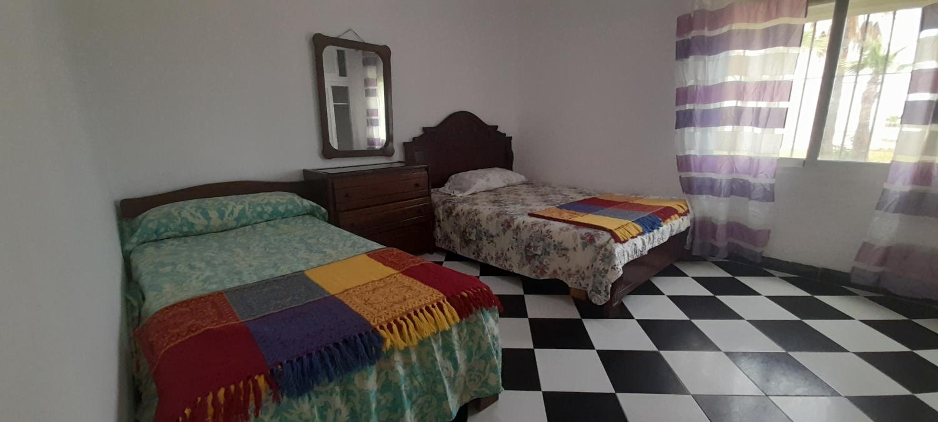 Three-Bedroom Apartment photo 1