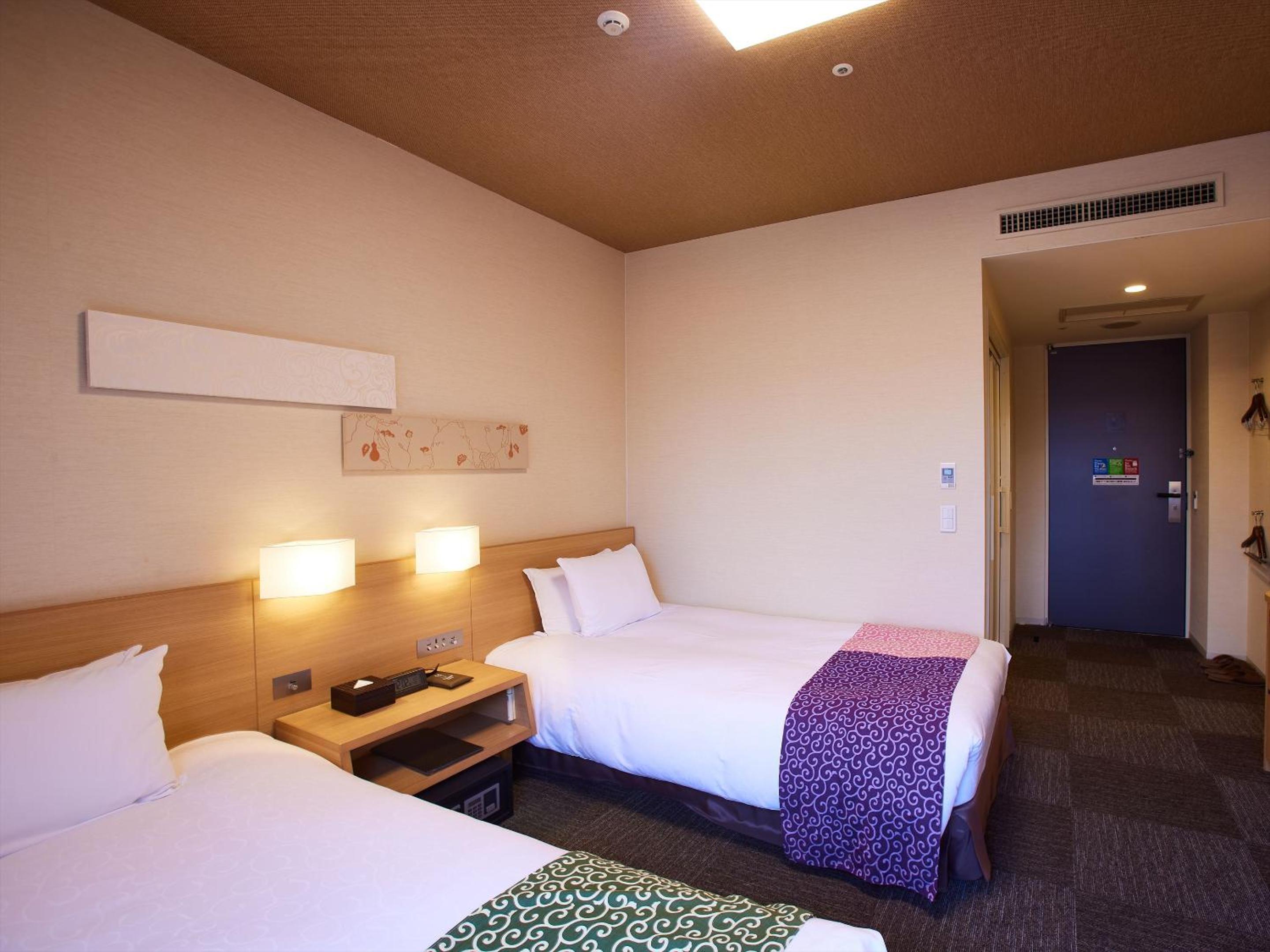Universal Twin Room - Photo 16