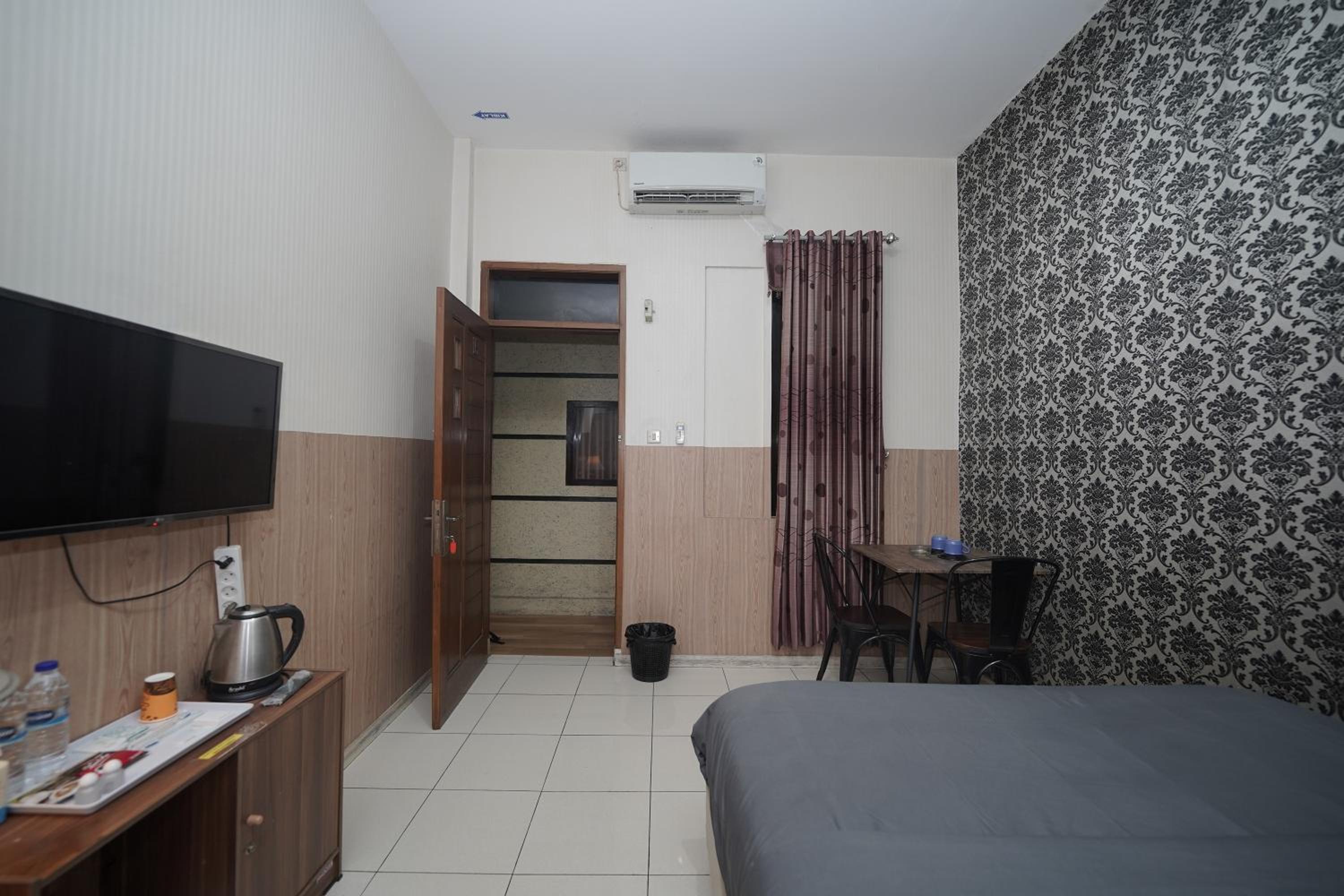 Deluxe Room - Photo 14