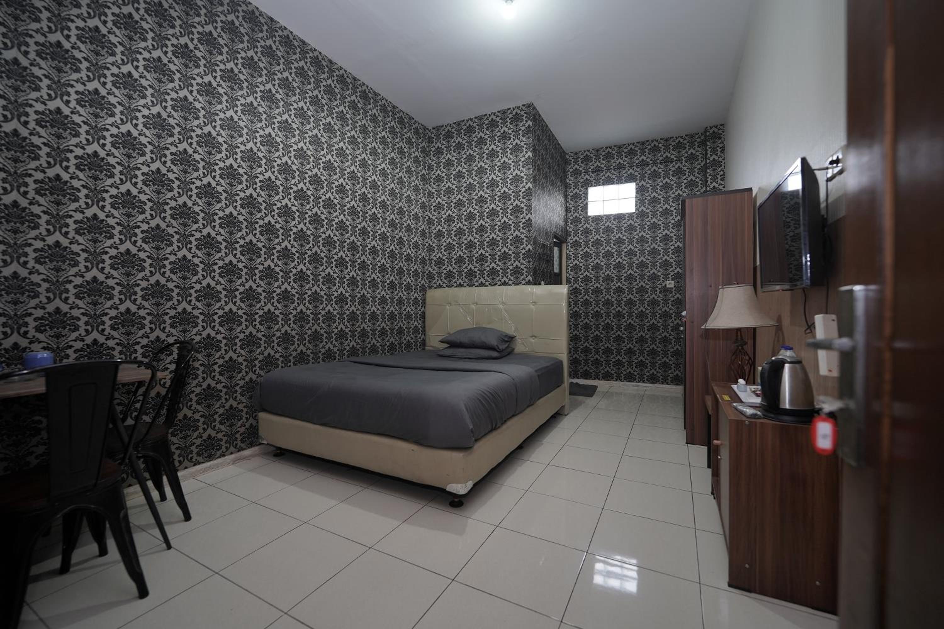 Deluxe Room - Photo 1