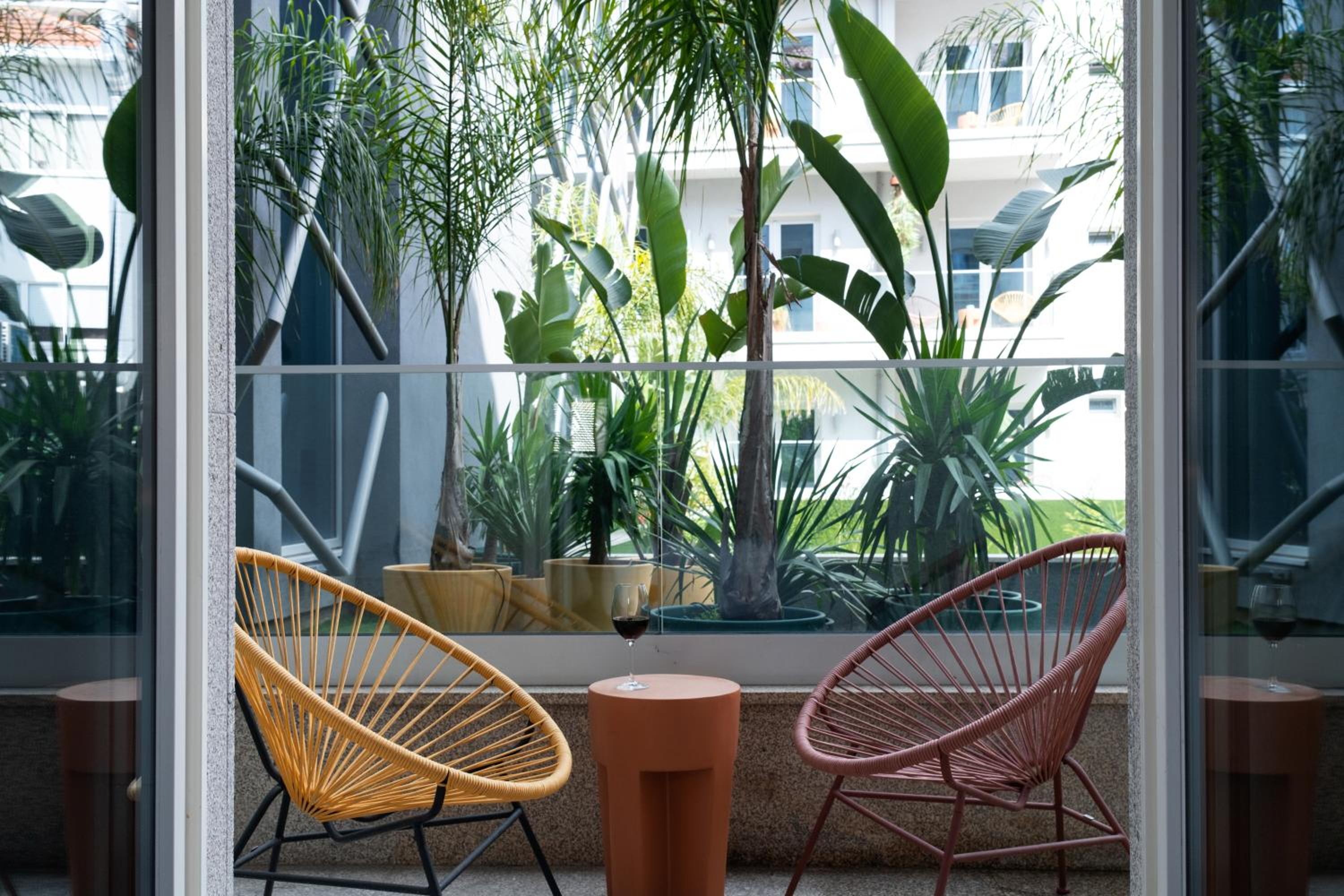 Deluxe Room Garden View with Balcony - Photo 8