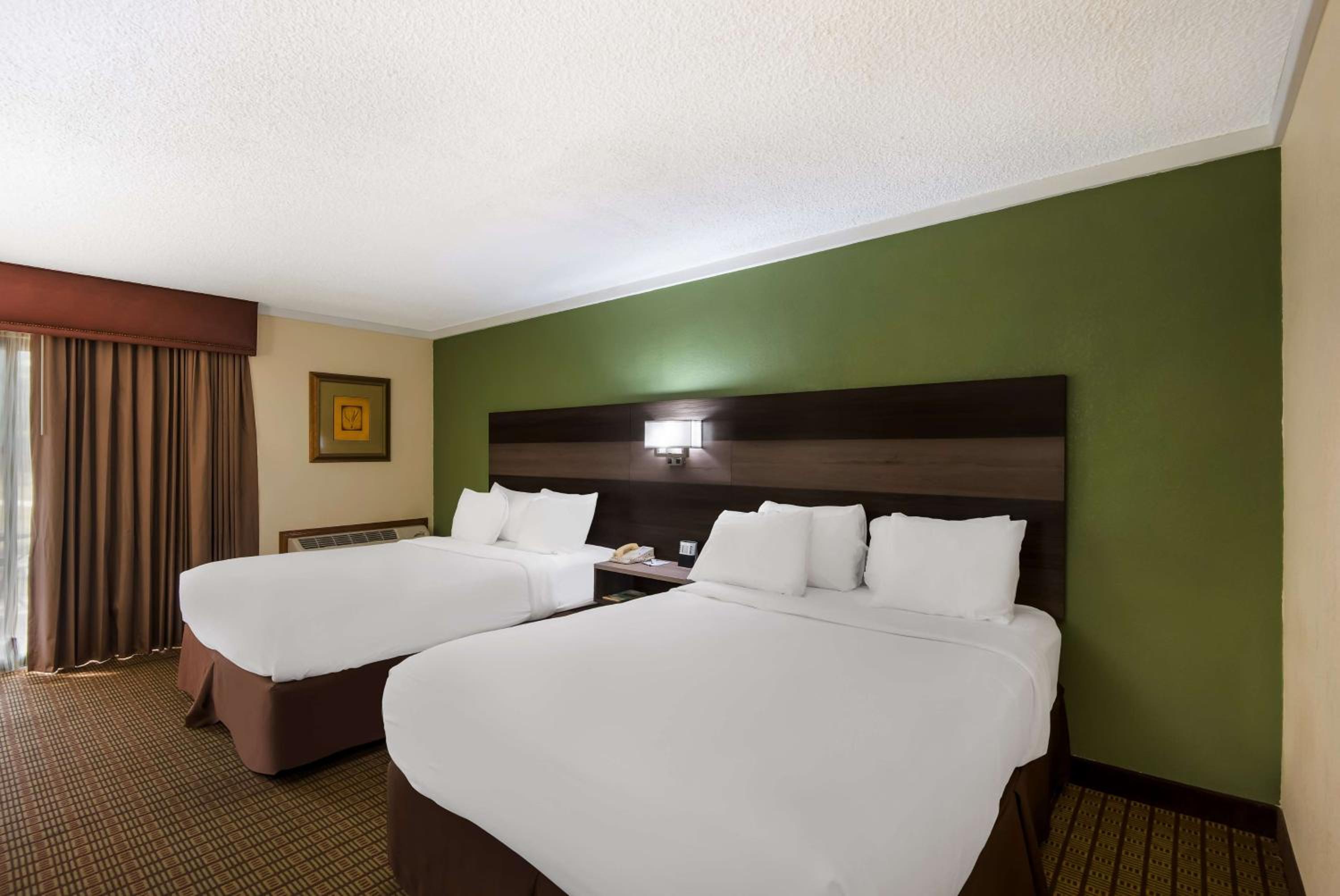 Queen Room with Two Queen Beds, Patio and Courtyard View - Non-Smoking/Ground Floor - Photo 1