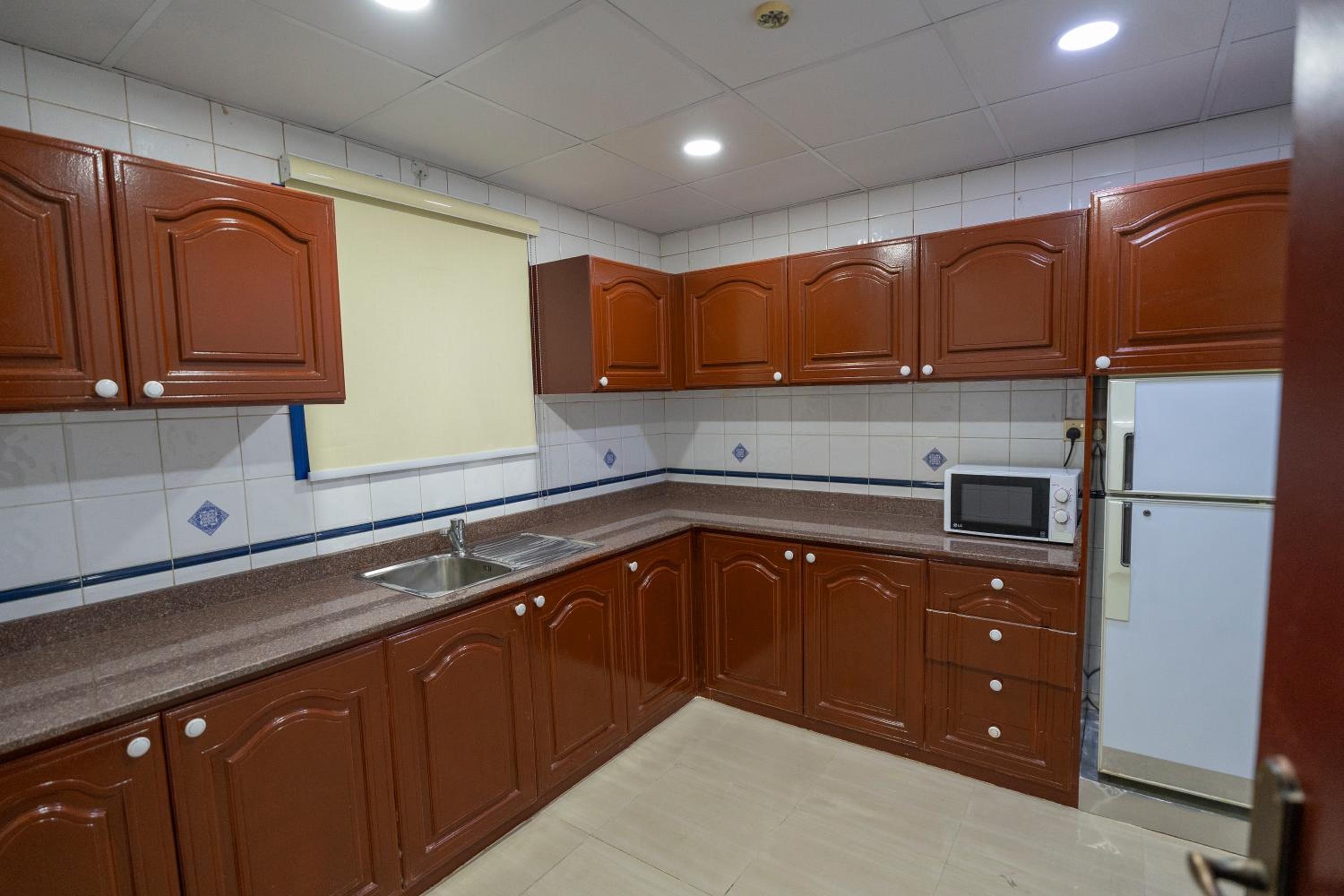 Two-Bedroom Apartment - Photo 36