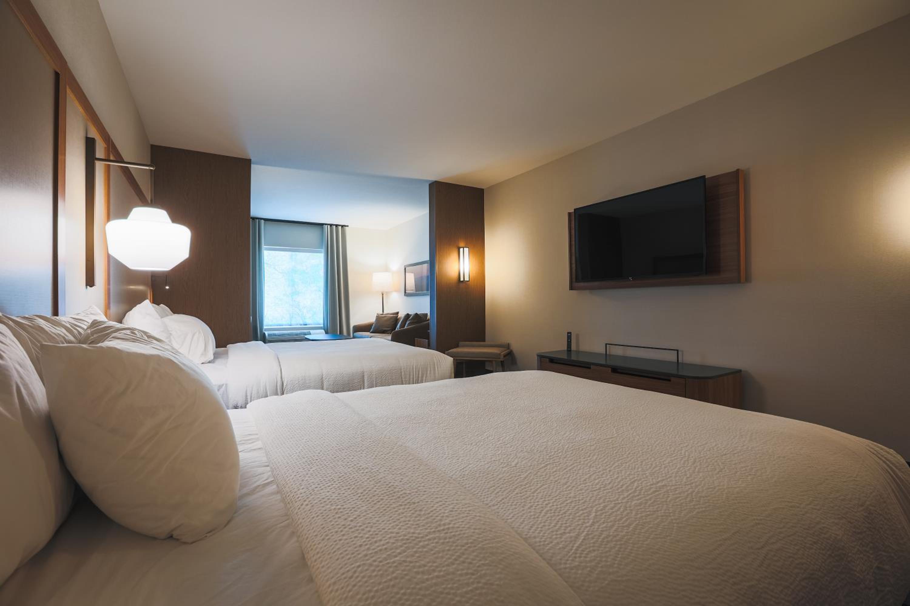 Suite, 2 Queen, Sofa bed, Partial lake view         - Photo 1