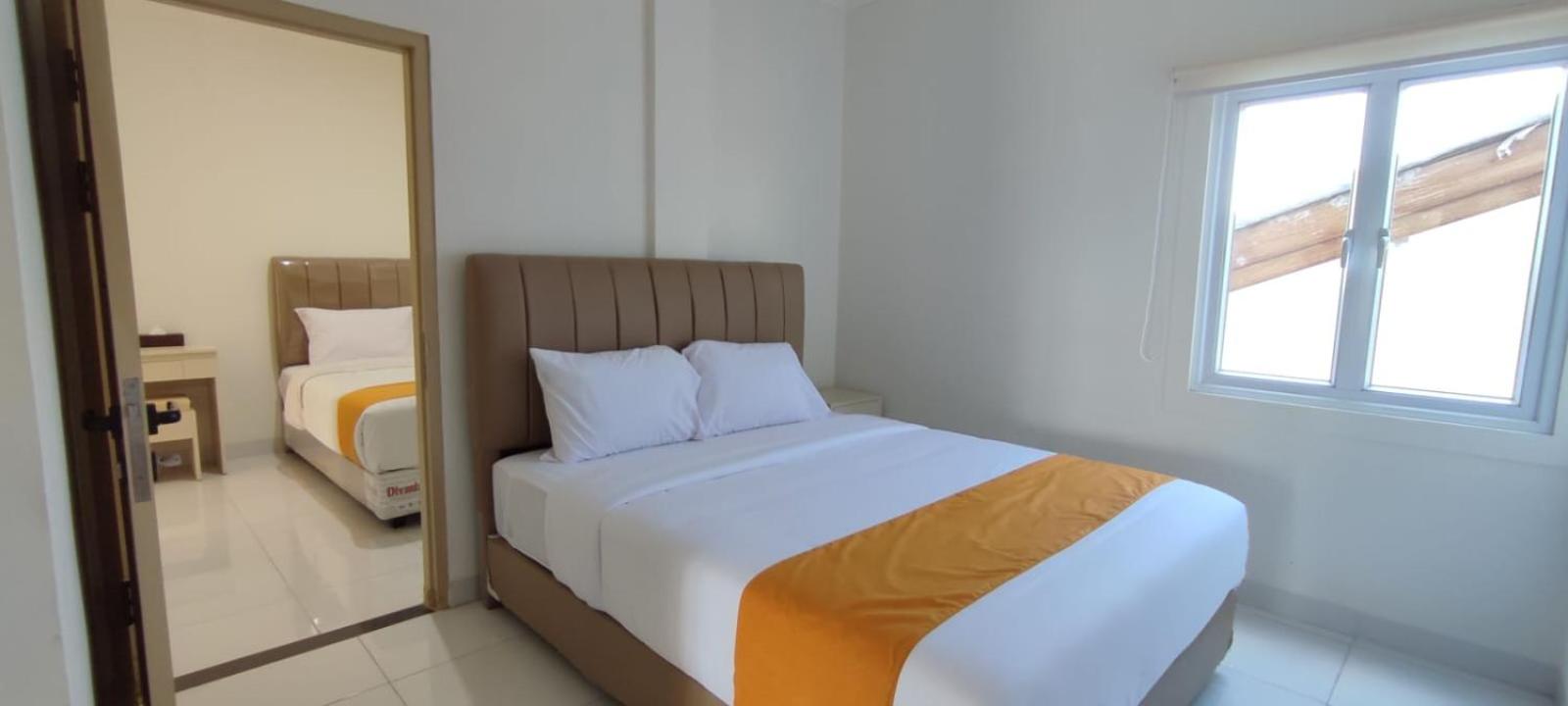 Deluxe Room - Photo 9