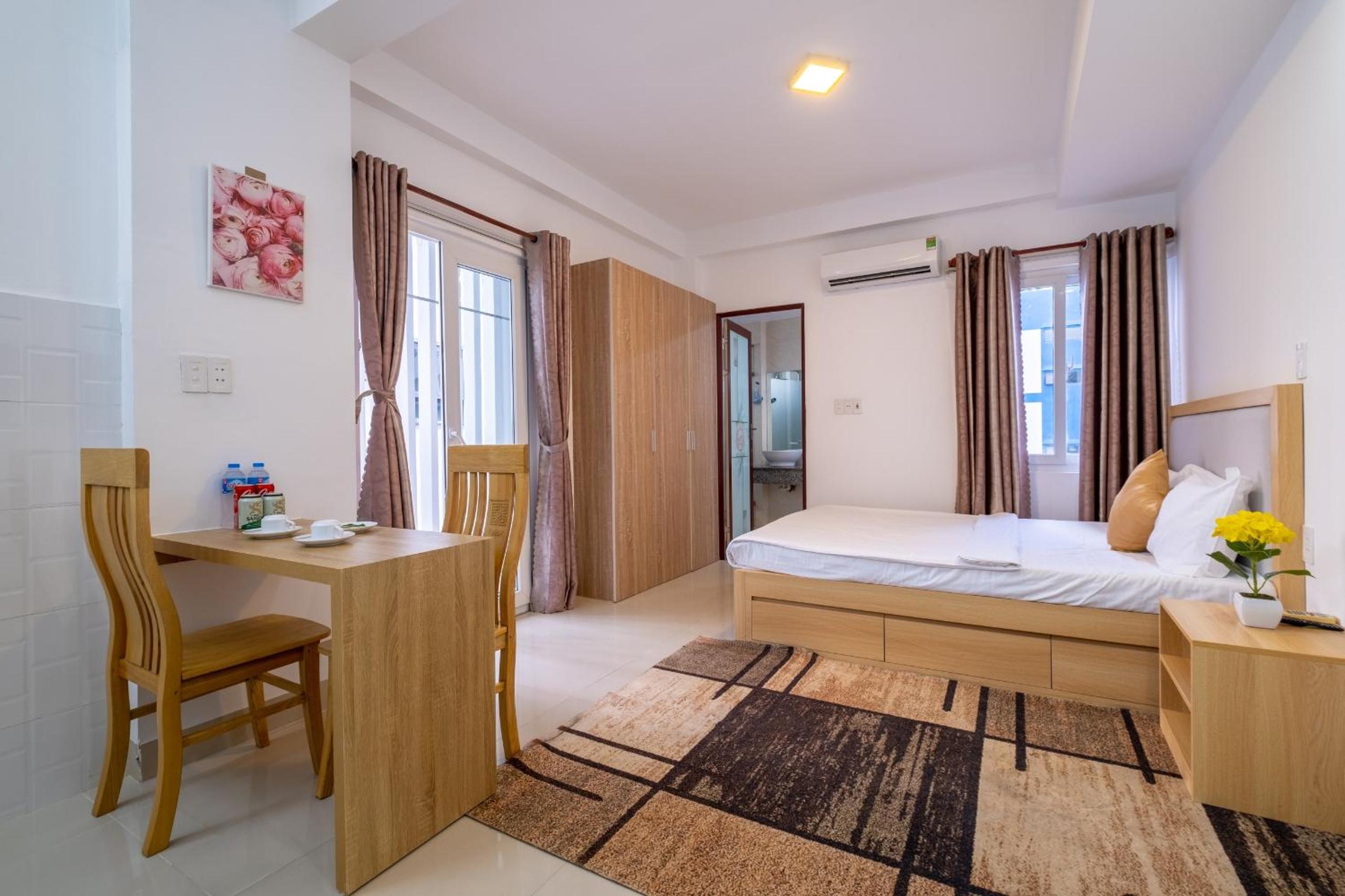 Deluxe Quadruple Room - Photo 8