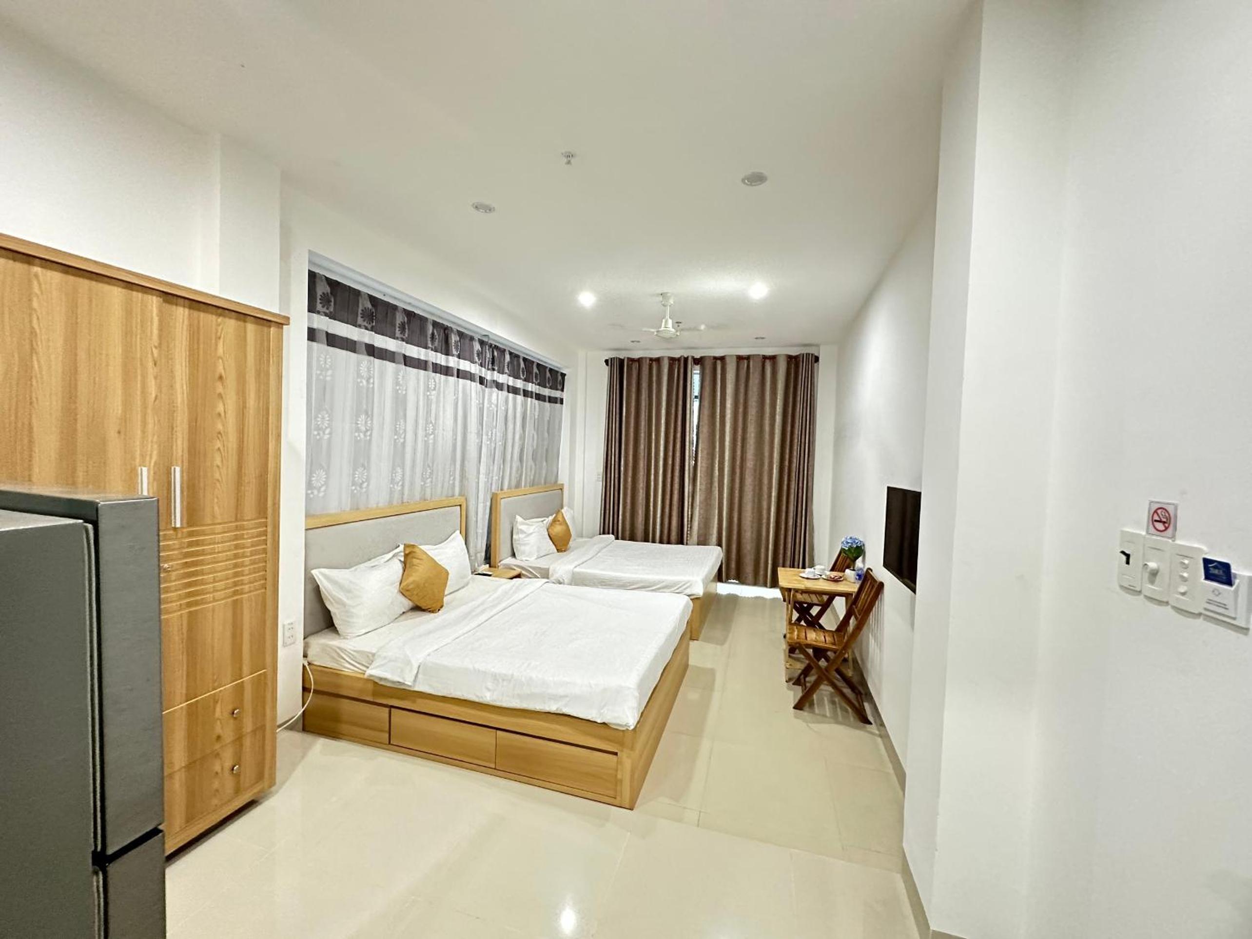 Deluxe Quadruple Room - Photo 15