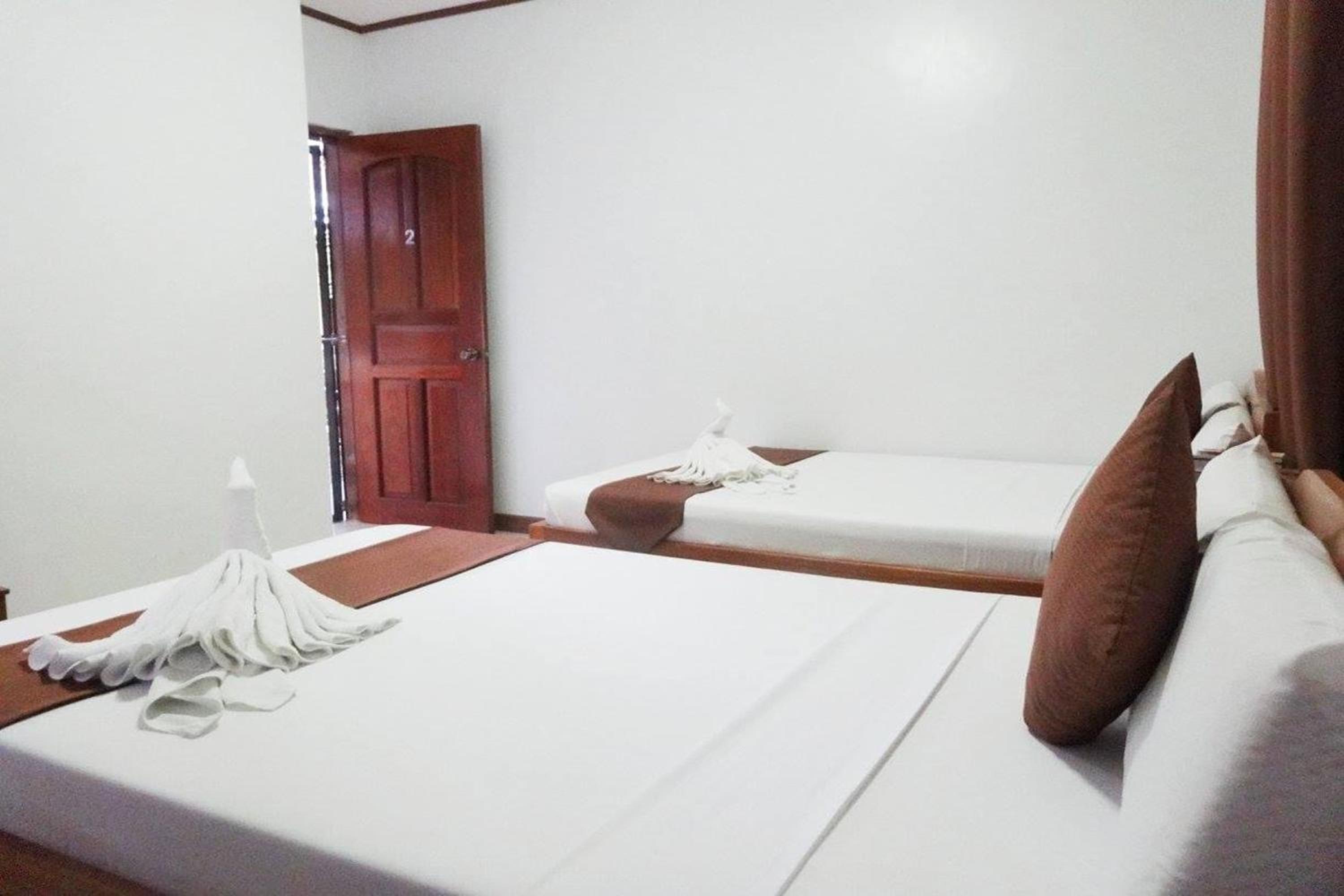 Deluxe Quadruple Room - Photo 7