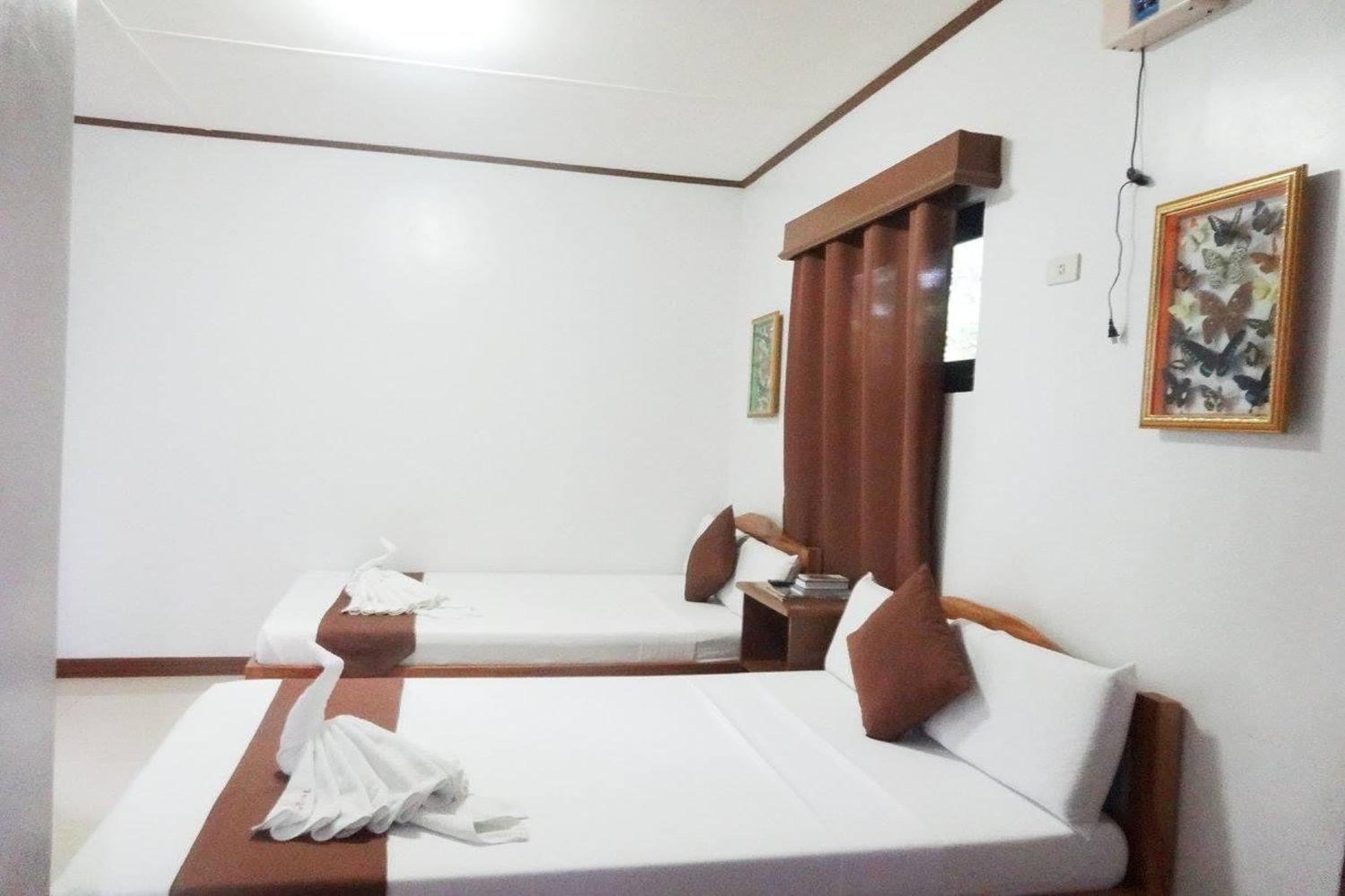 Deluxe Quadruple Room - Photo 8