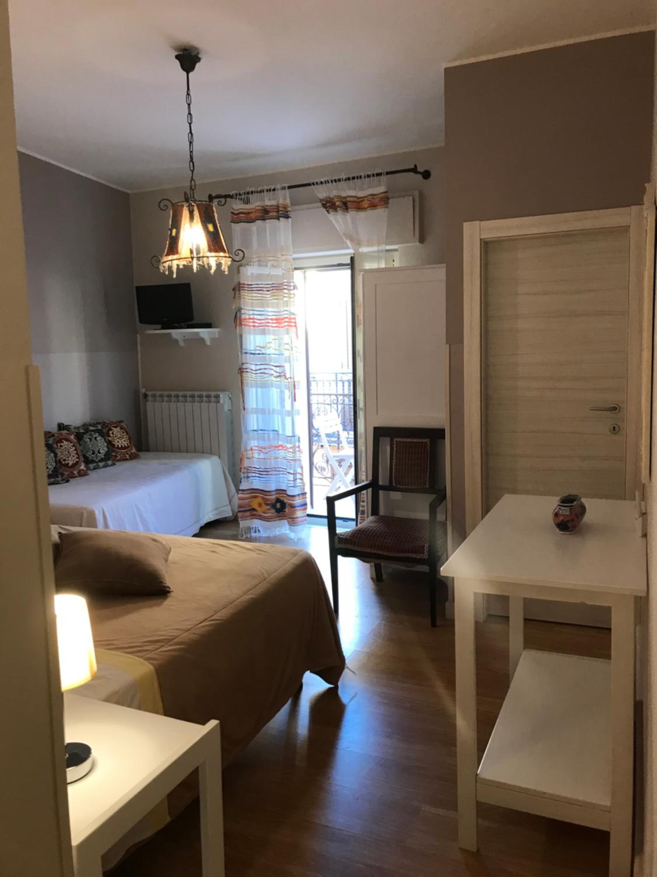 Triple Room with Balcony - Photo 13