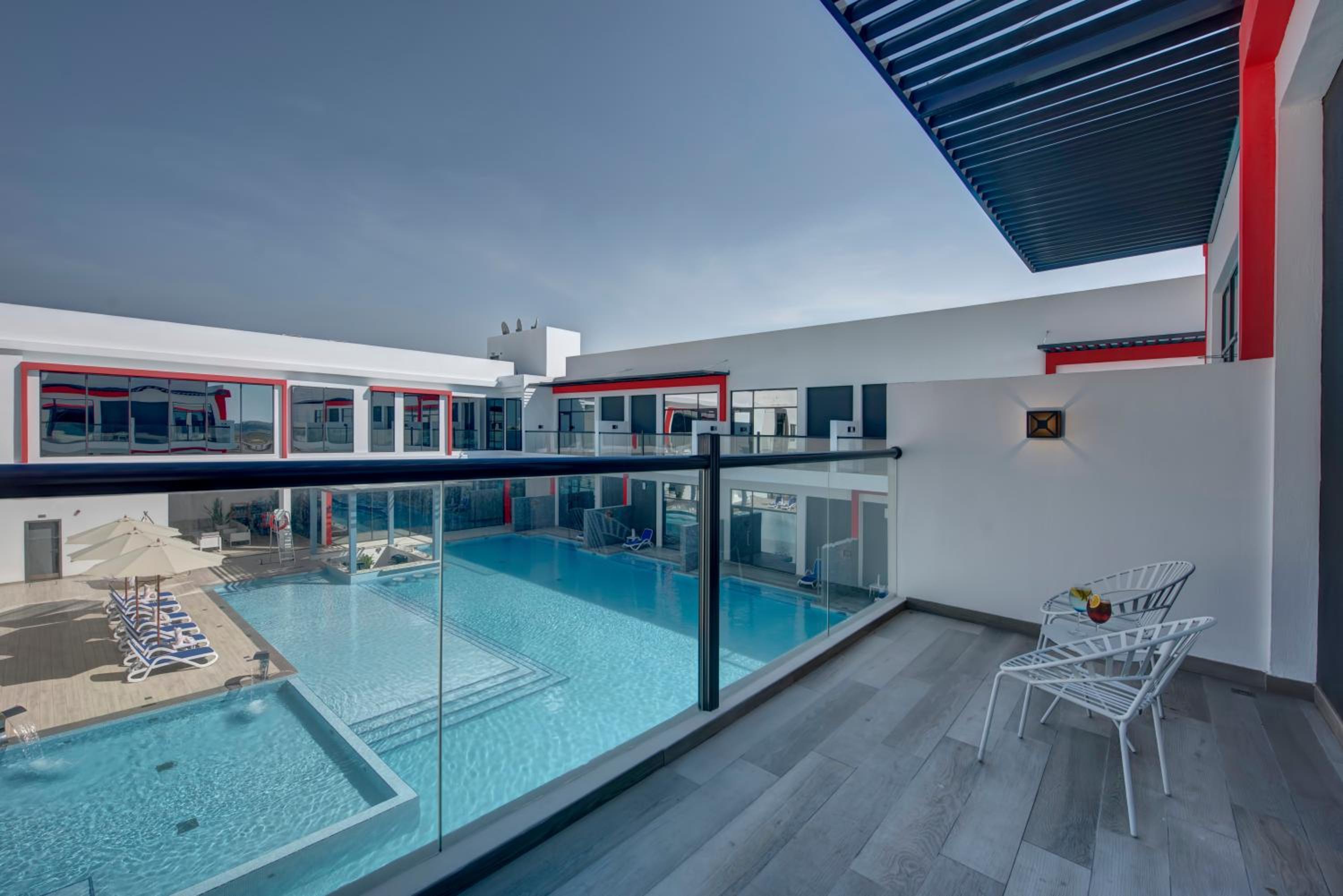 Chalet King Bed with the balcony-pool view