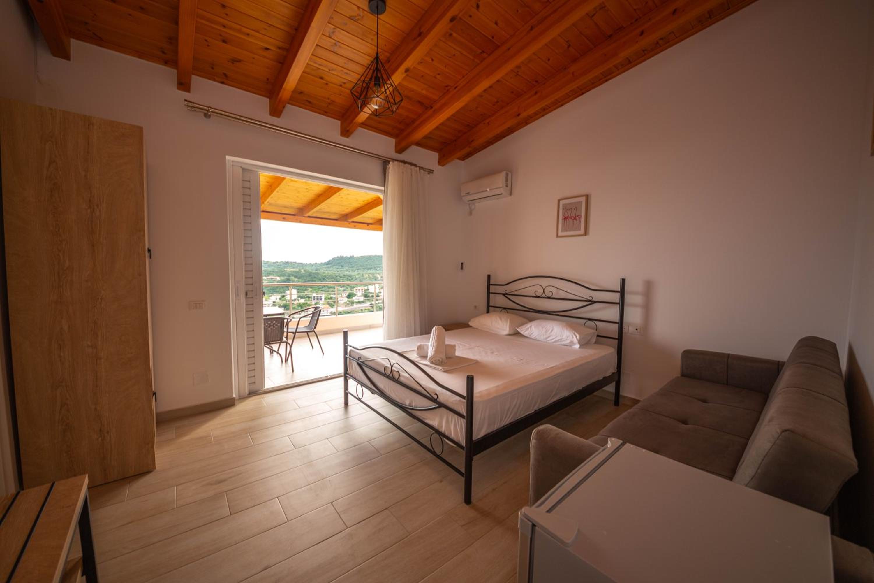 Triple Room with Balcony and Sea View