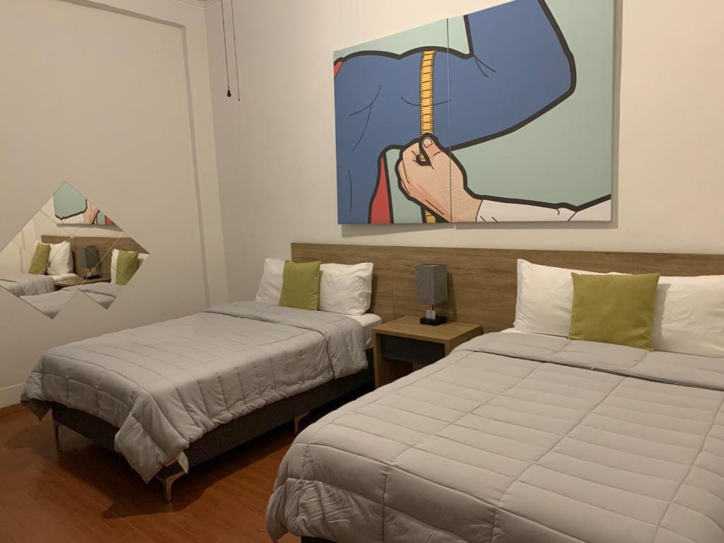 Economy Quadruple Room - Photo 4