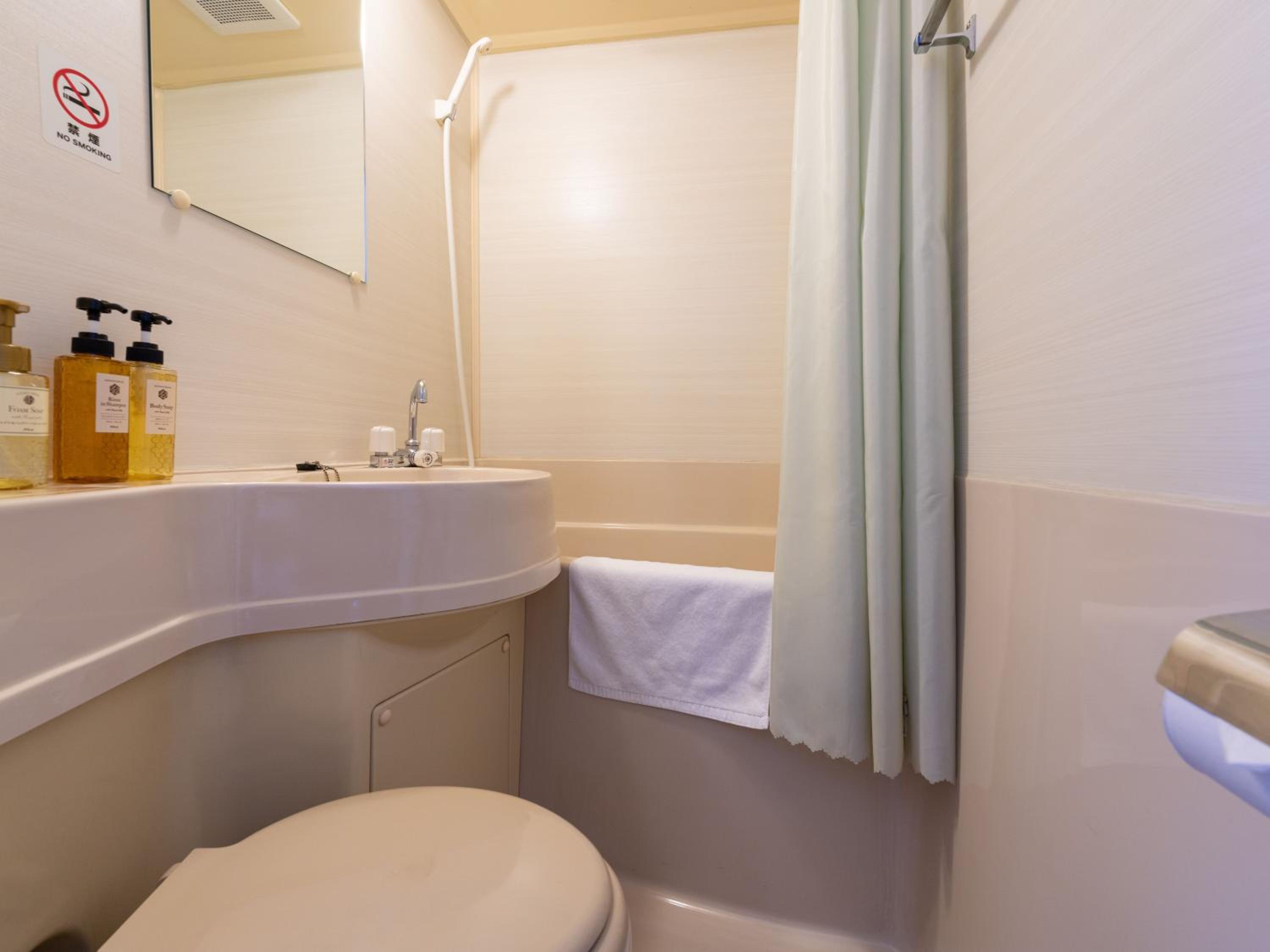 Standard Twin Room - Photo 11