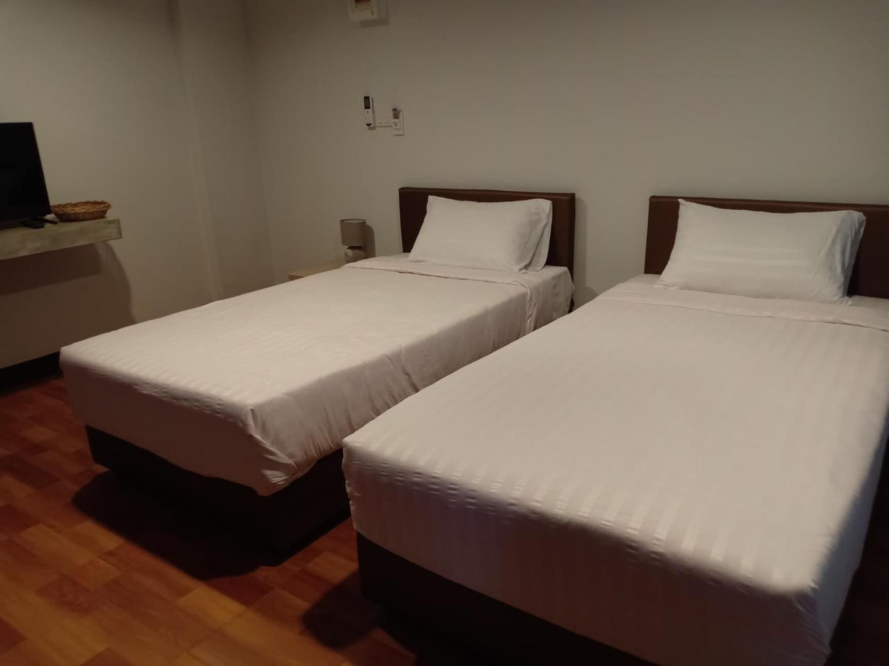 Standard Twin Room - Photo 7