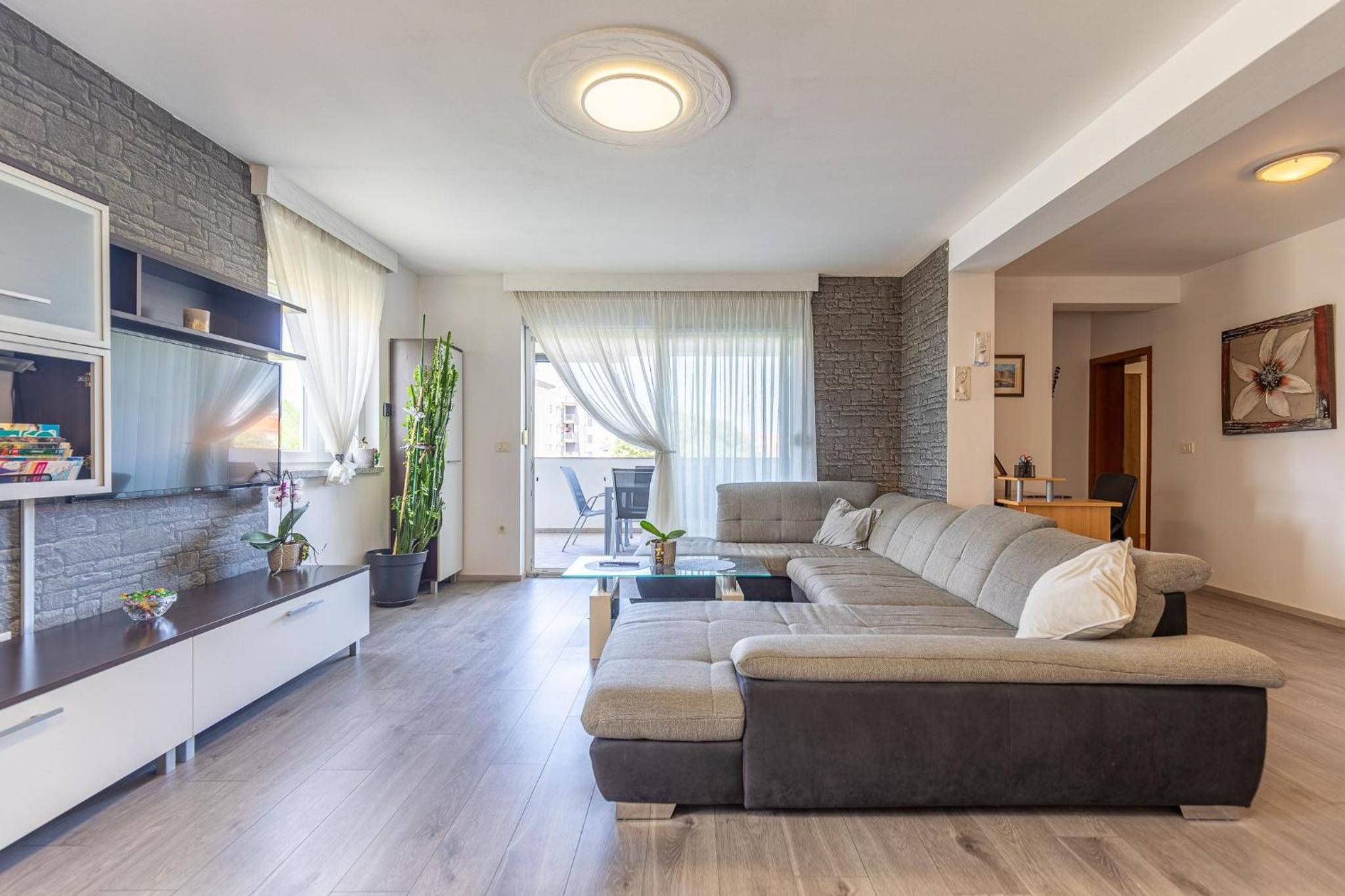 Three-Bedroom Apartment with Balcony and Terrace