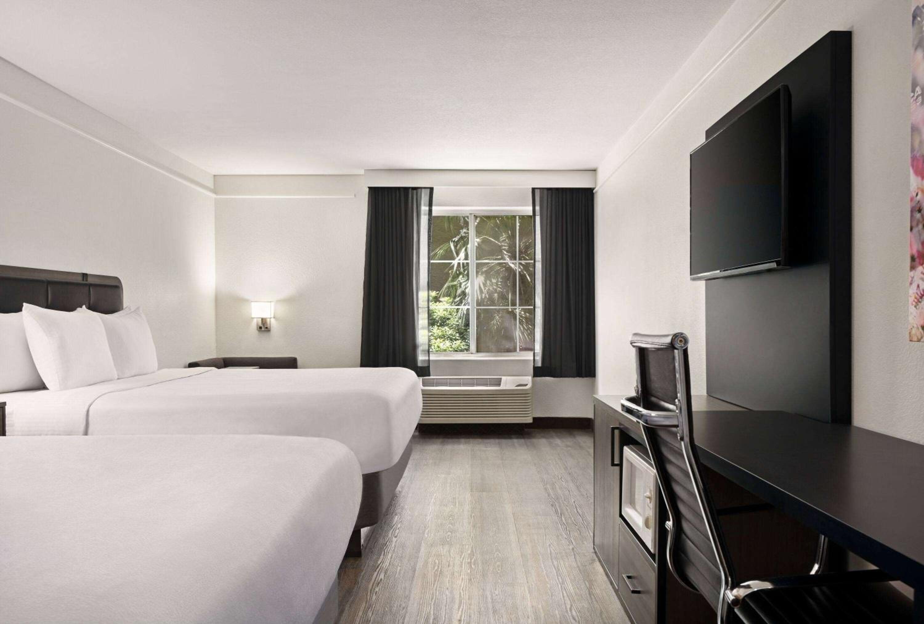 King Room with Two King Beds - Non-Smoking - Photo 1
