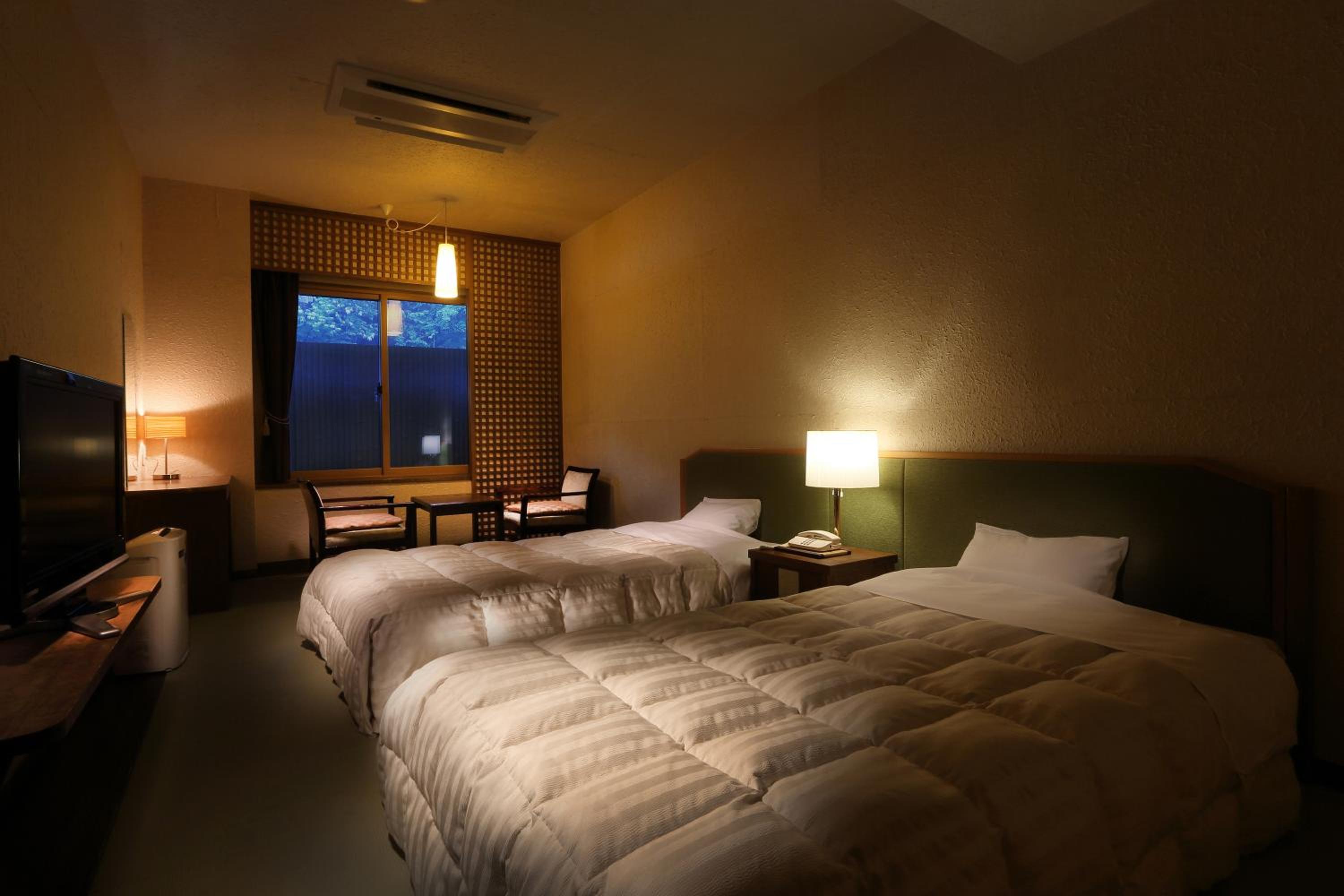 Standard Twin Room - Photo 1