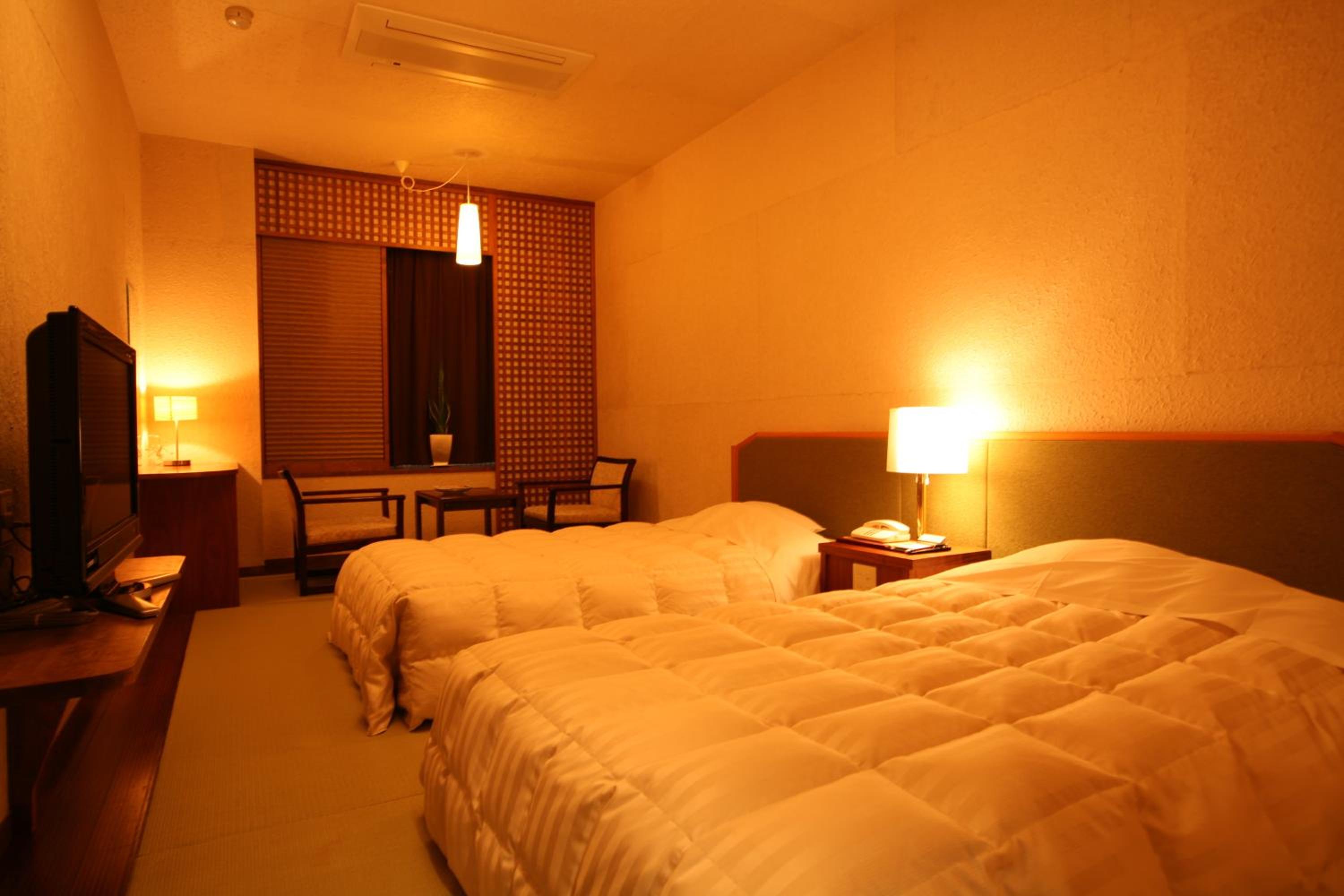 Standard Twin Room - Photo 4