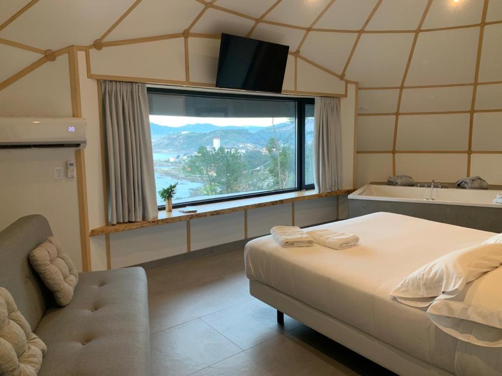 Bungalow con vista al mar