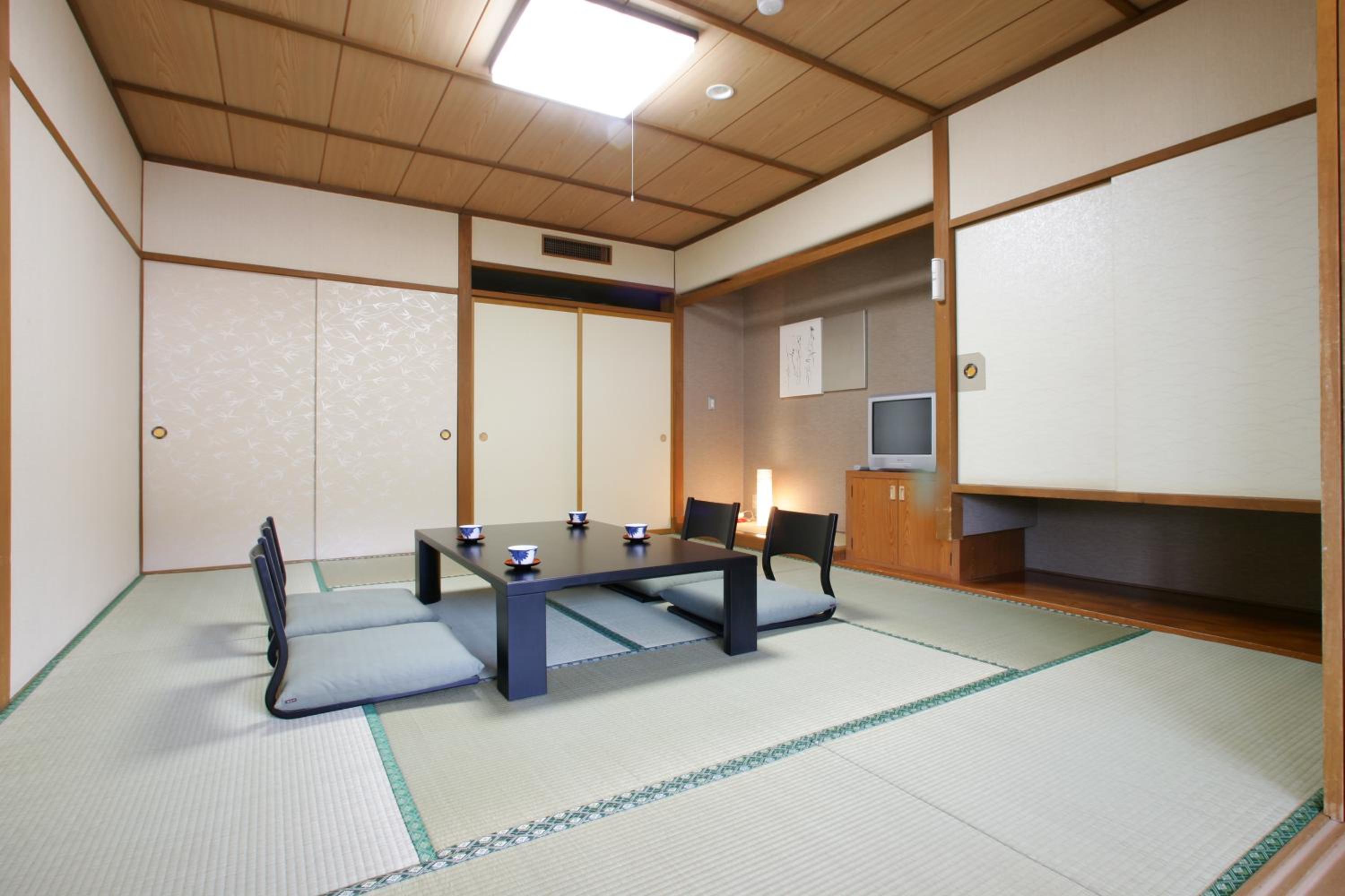Quadruple Room with Shared Bathroom