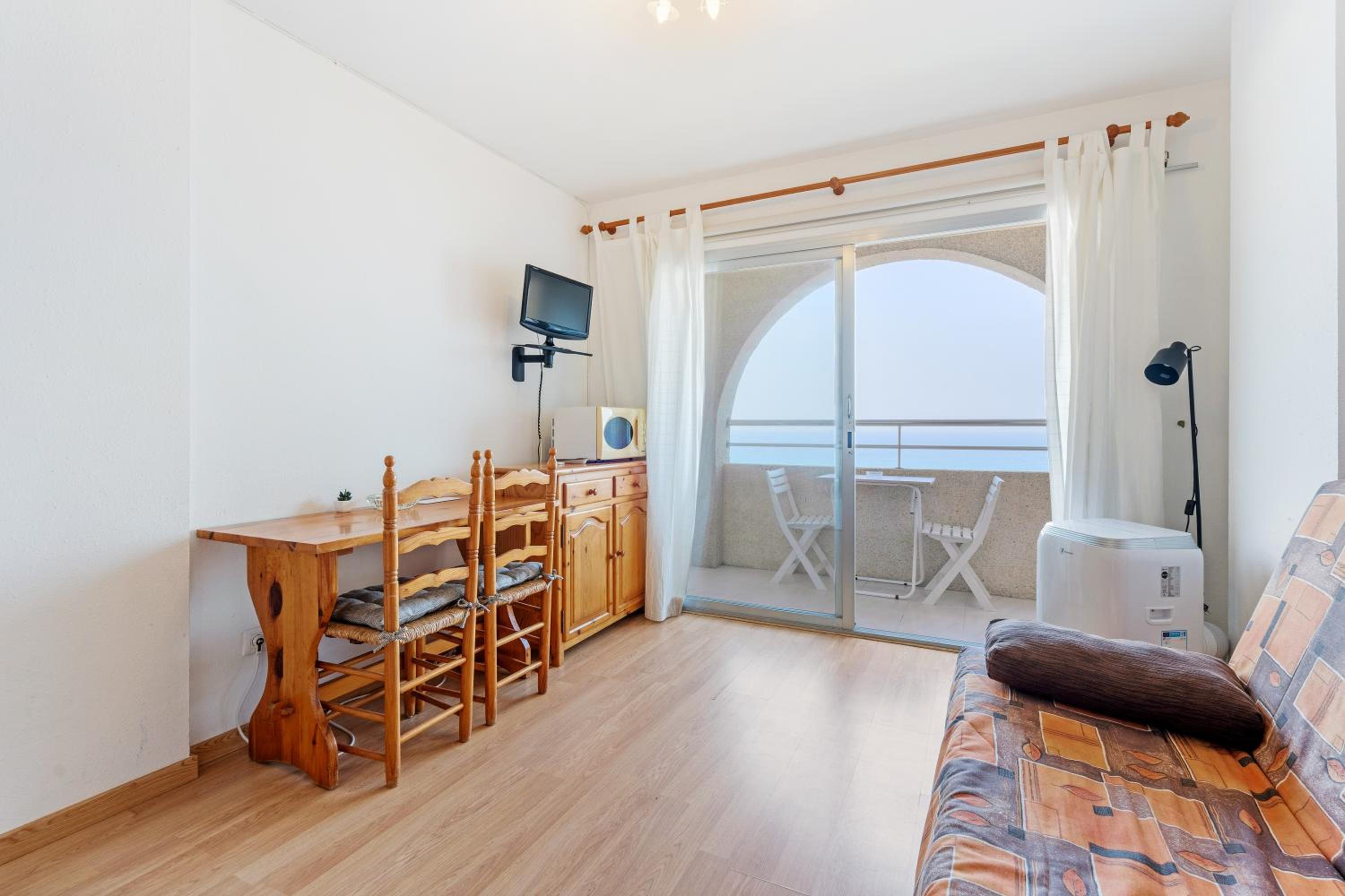 Estudio con sofá cama
