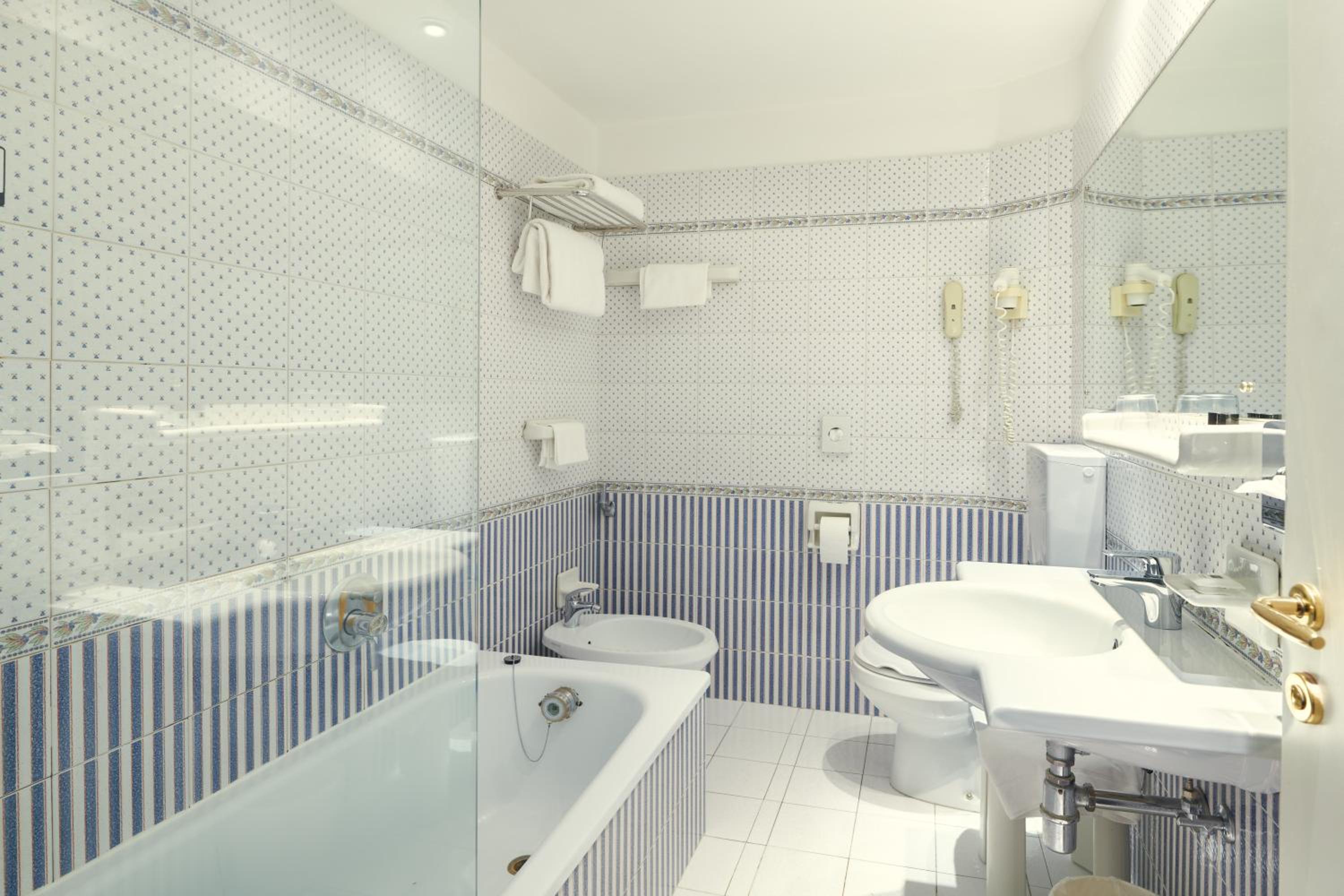 Experience a refreshing retreat in this modern bathroom.