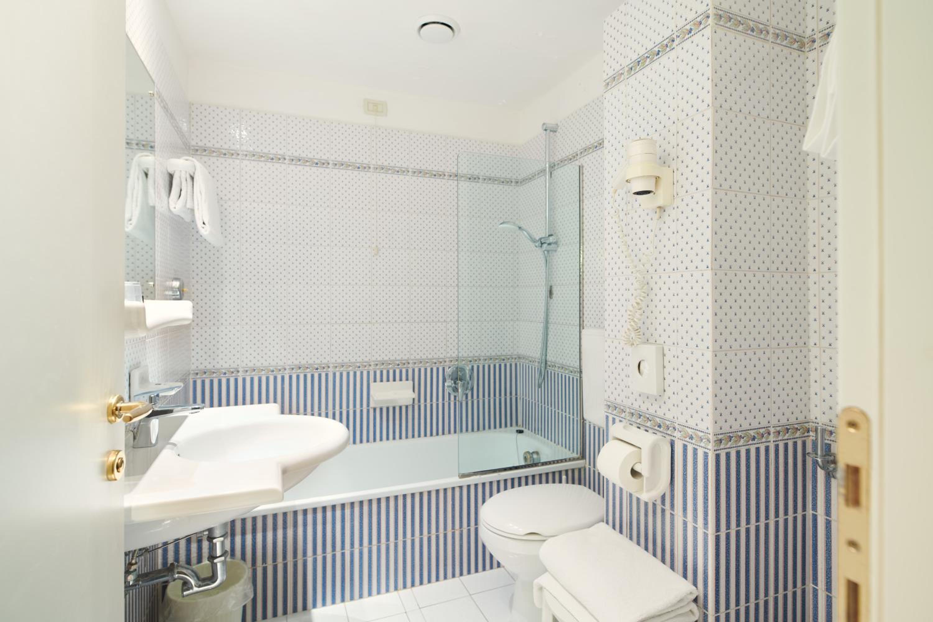 Relax in a stylish, serene bath retreat.