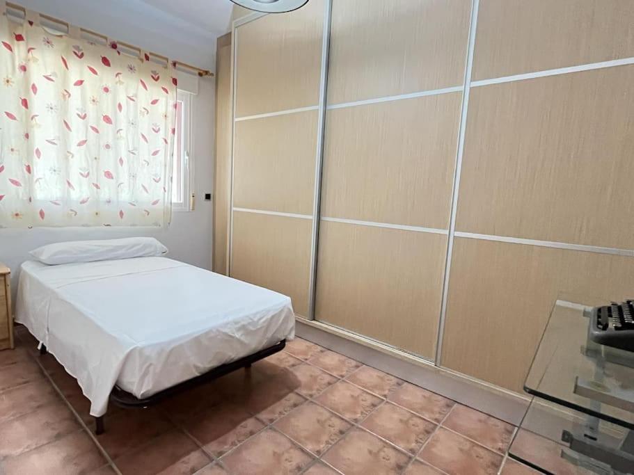 Casa de cuatro habitaciones