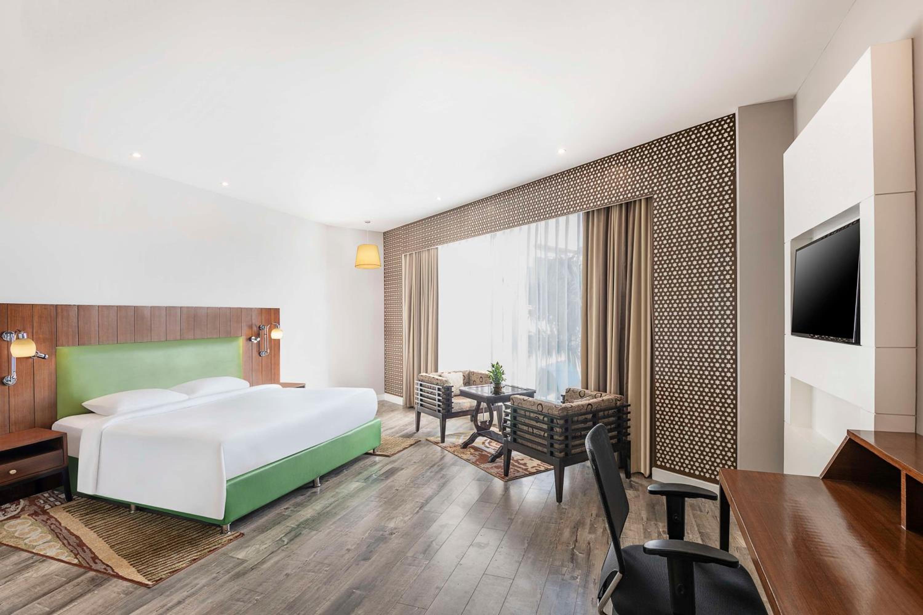 Deluxe King Room - Non-Smoking - Photo 1
