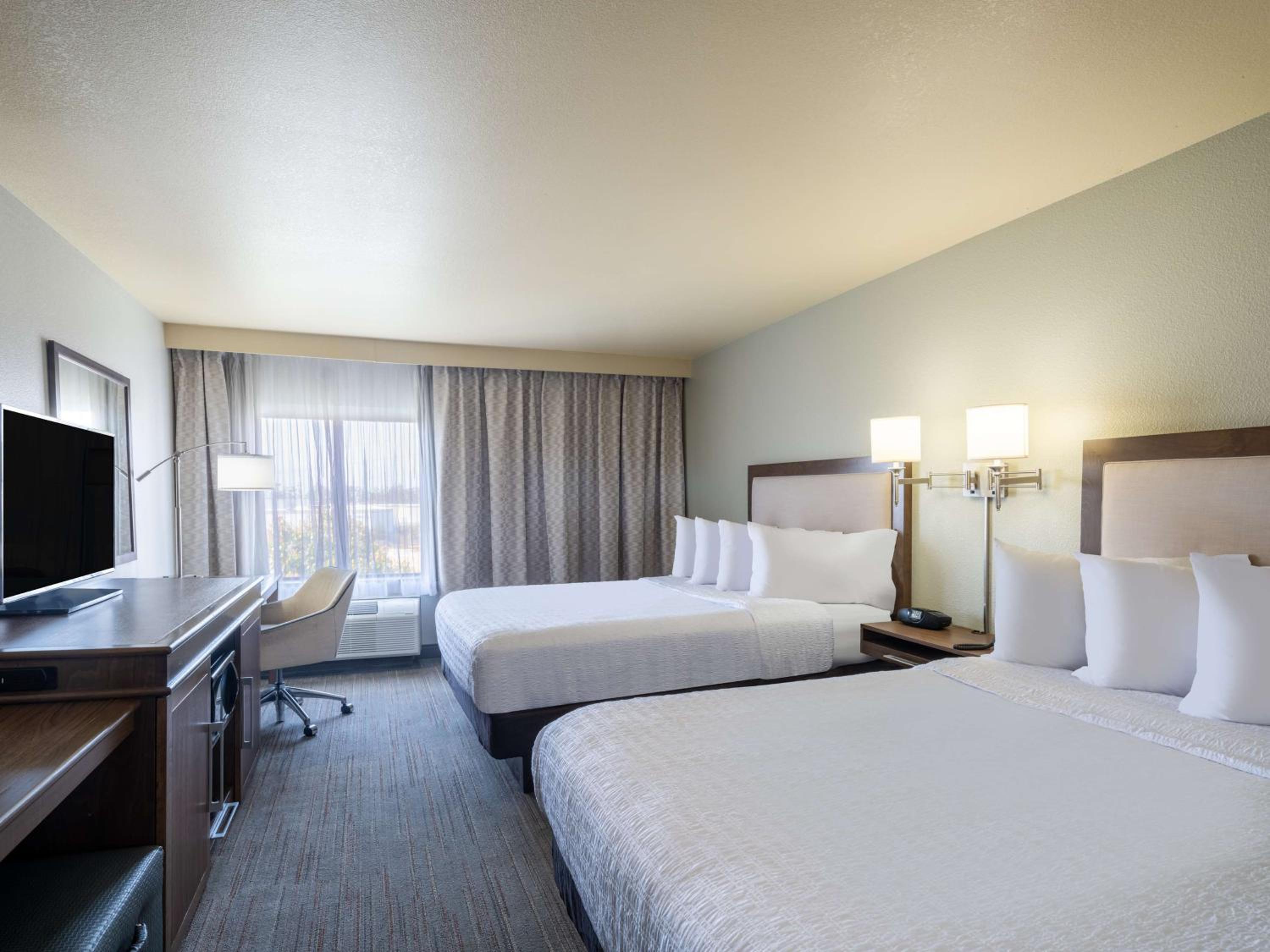 Queen Room with Two Queen Beds - Photo 1