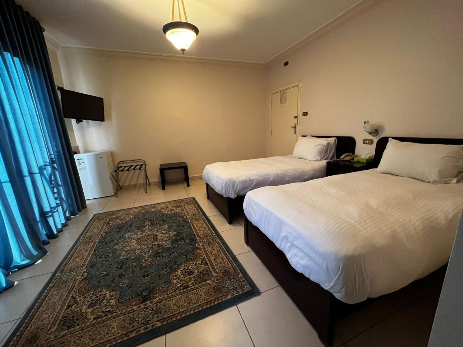 Standard Twin Room - Photo 13