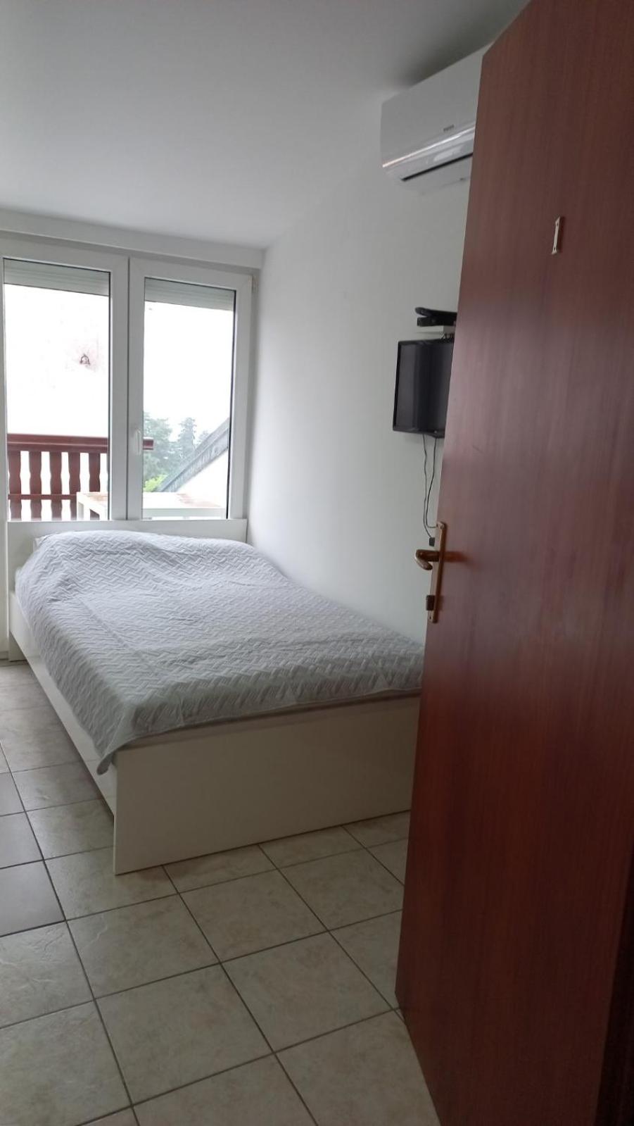 One-Bedroom Apartment with Balcony and Sea View