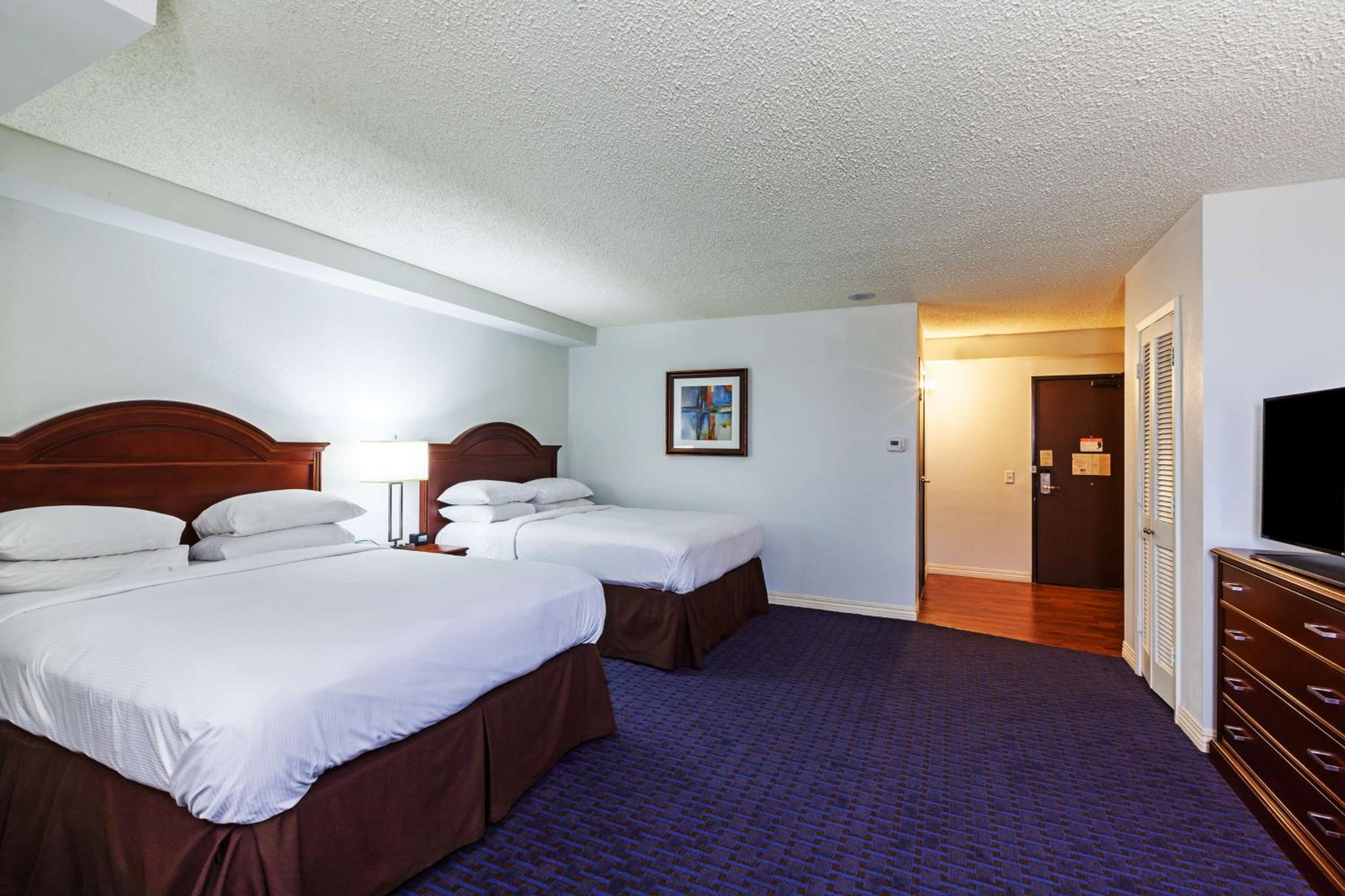 Deluxe Queen Room with Two Queen Beds and Tub - Mobility/Hearing Access - Photo 1