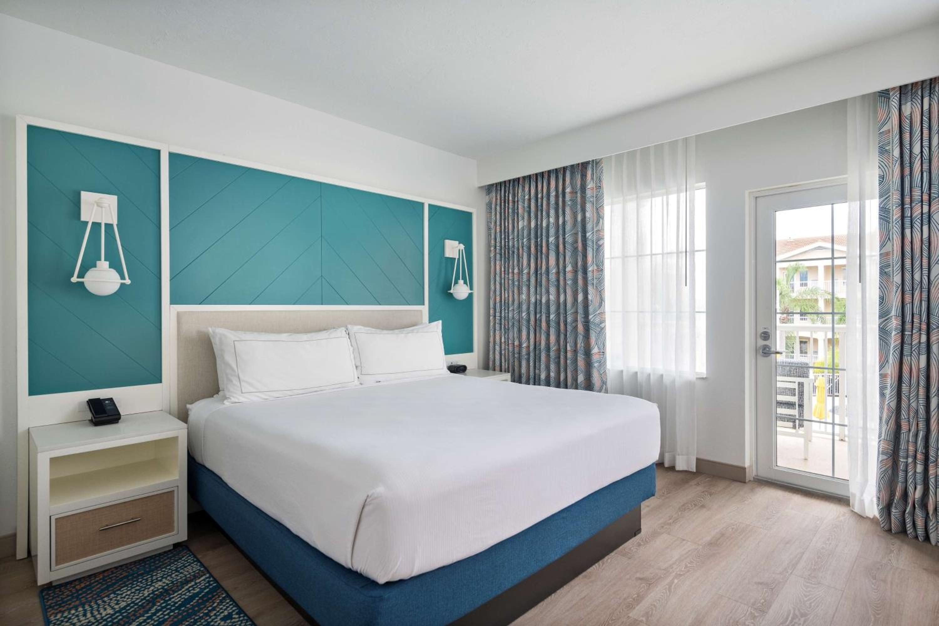 King Room with Balcony - Mobility Accessible at DoubleTree Suites by Hilton Naples in Naples
