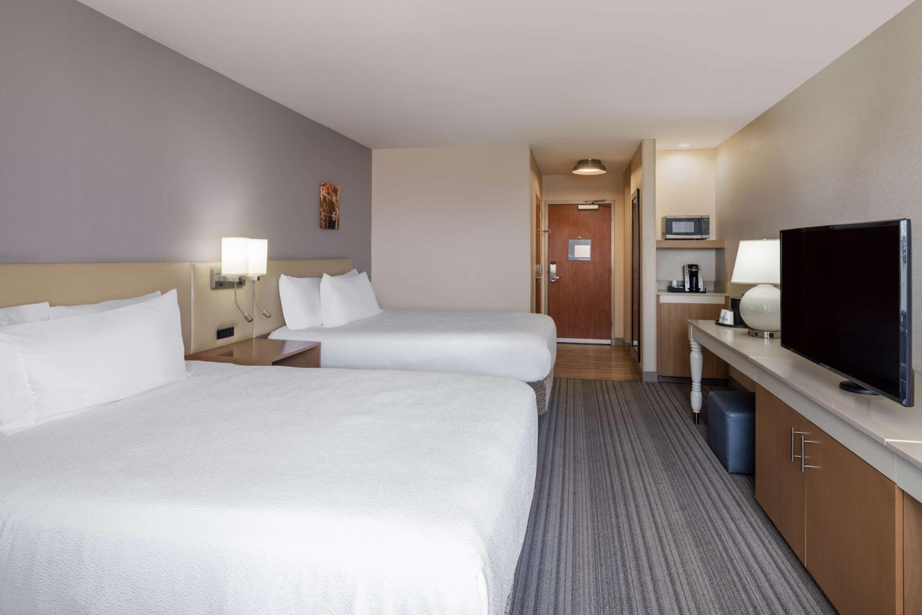 Queen Room with Two Queen Beds - Photo 1