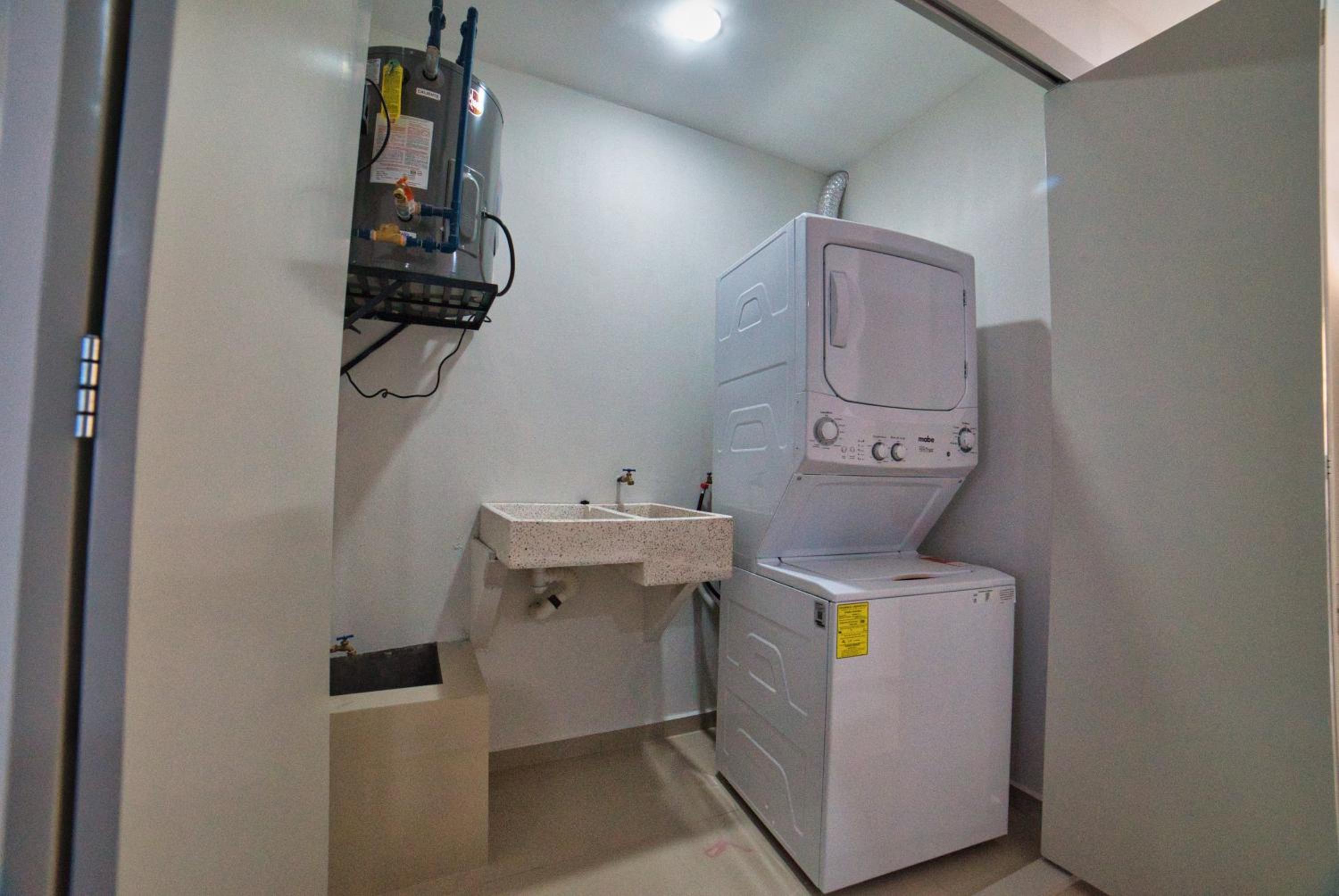 Three-Bedroom Apartment - Photo 33