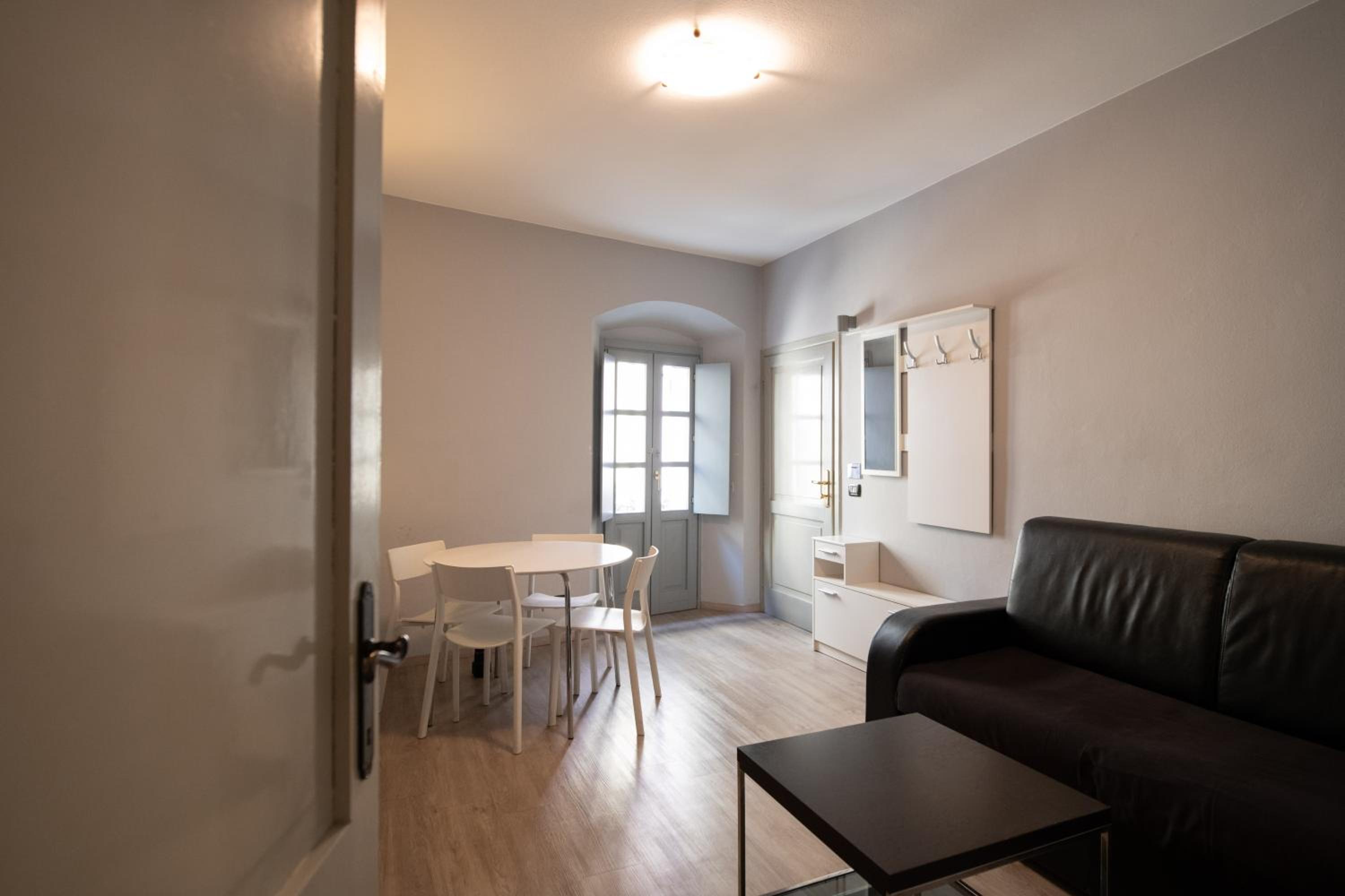 One-Bedroom Apartment with Balcony and City View