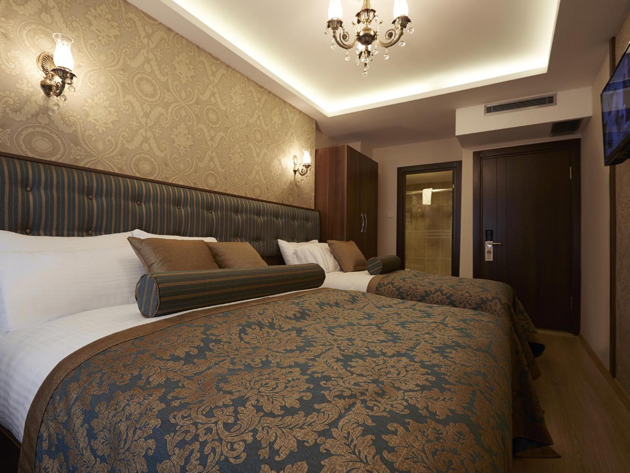 Deluxe Triple Room photo 2