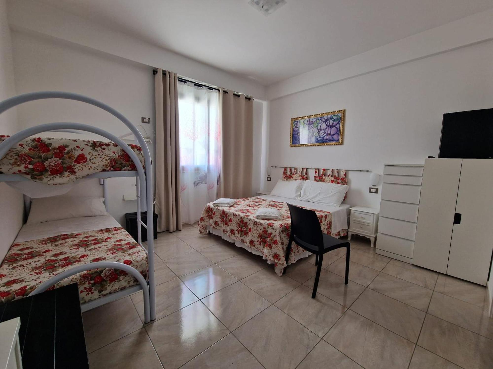 Deluxe Quadruple Room - Photo 3